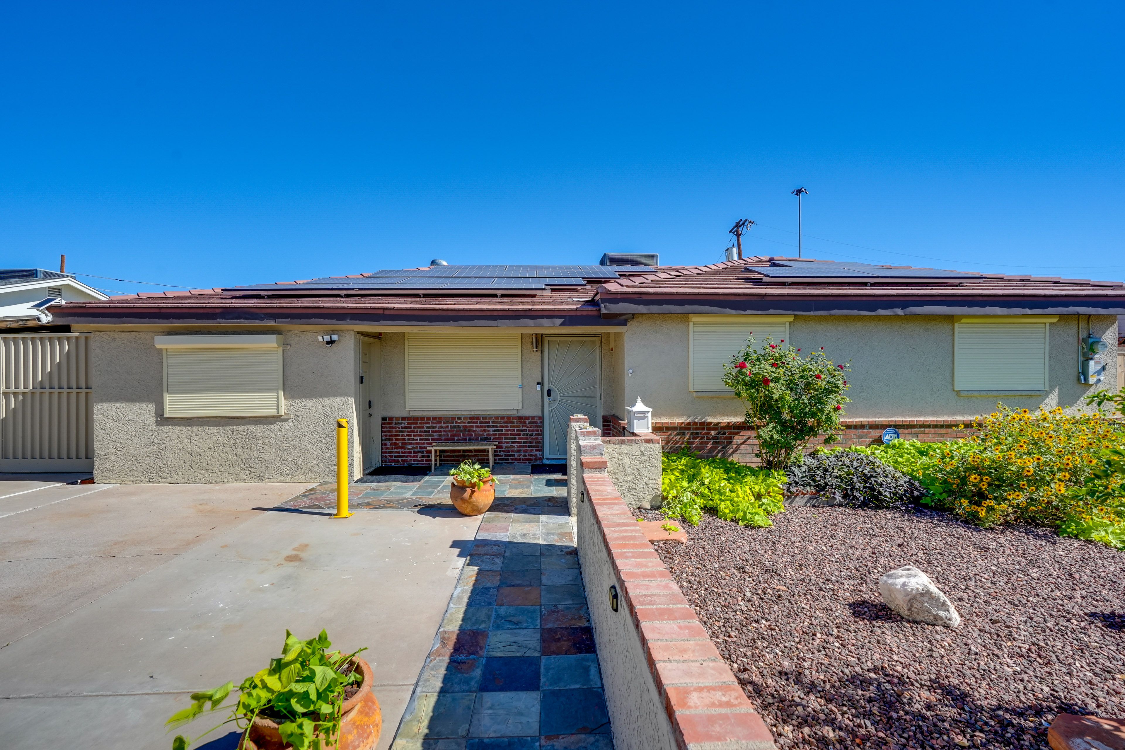 Property Exterior | Duplex | Gravel Driveway (1 Vehicle)