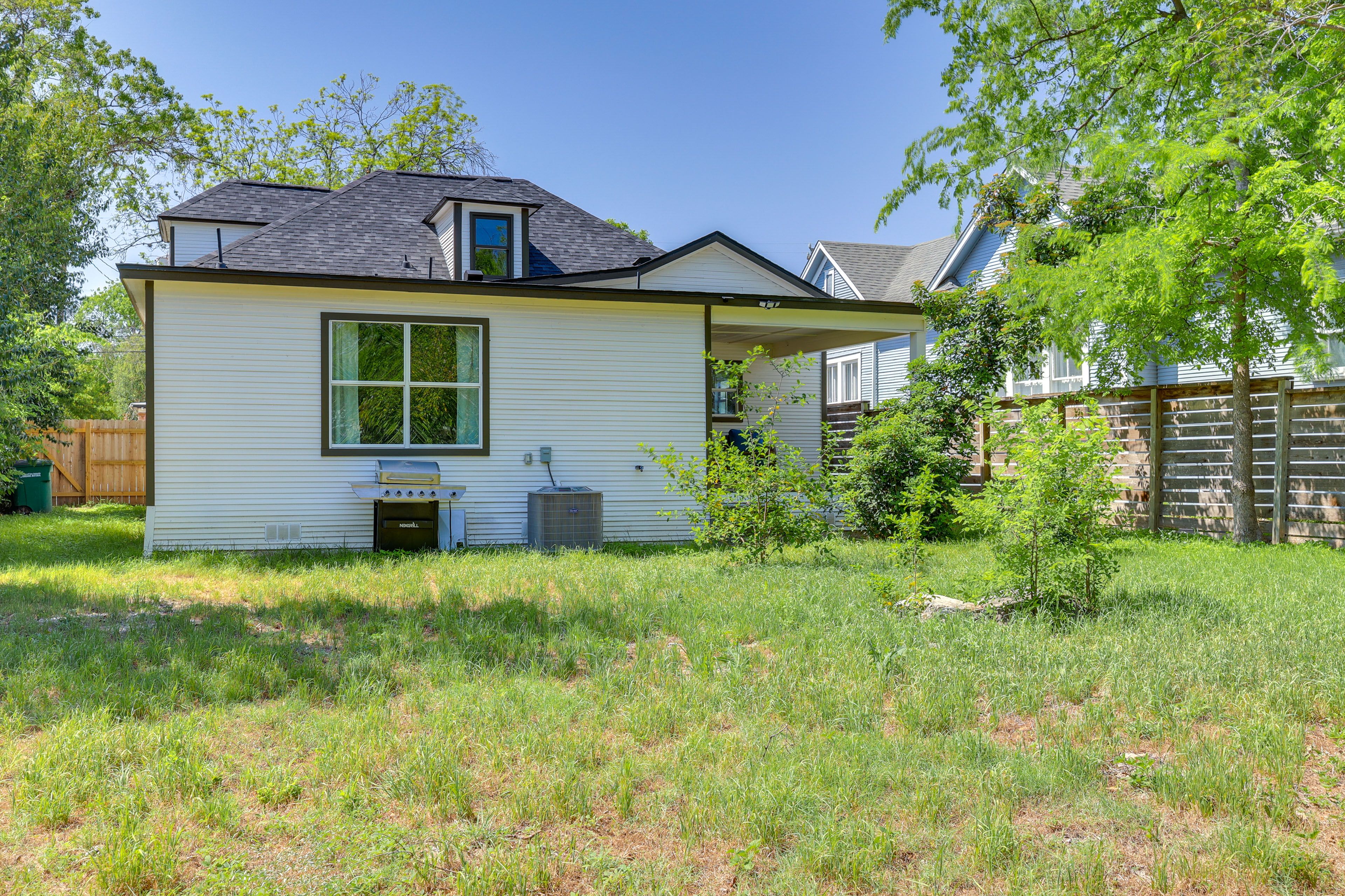 House Exterior | Gas Grill | Fenced Backyard