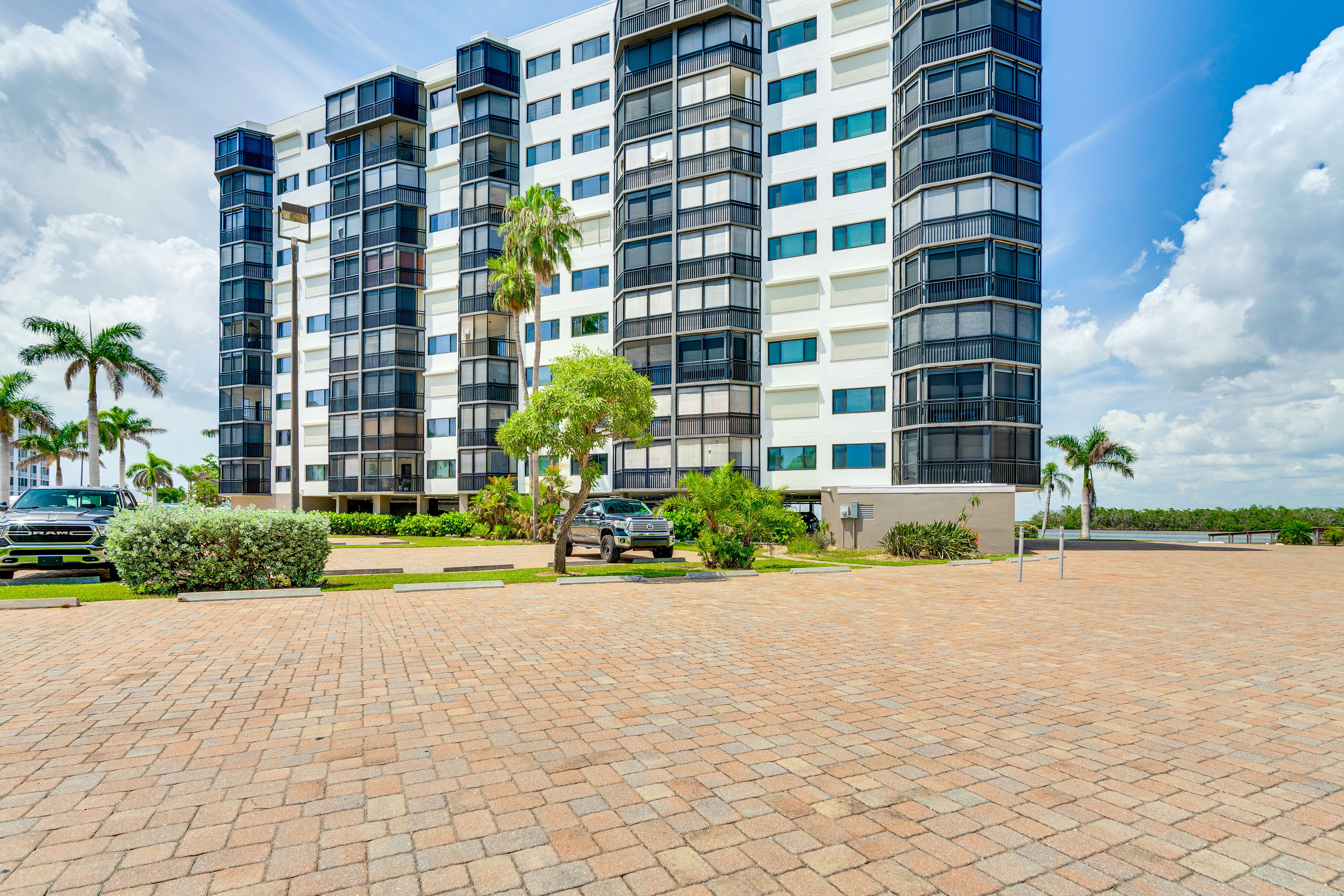 Property Exterior | Open Community Parking Lot (First-Come, First-Served)