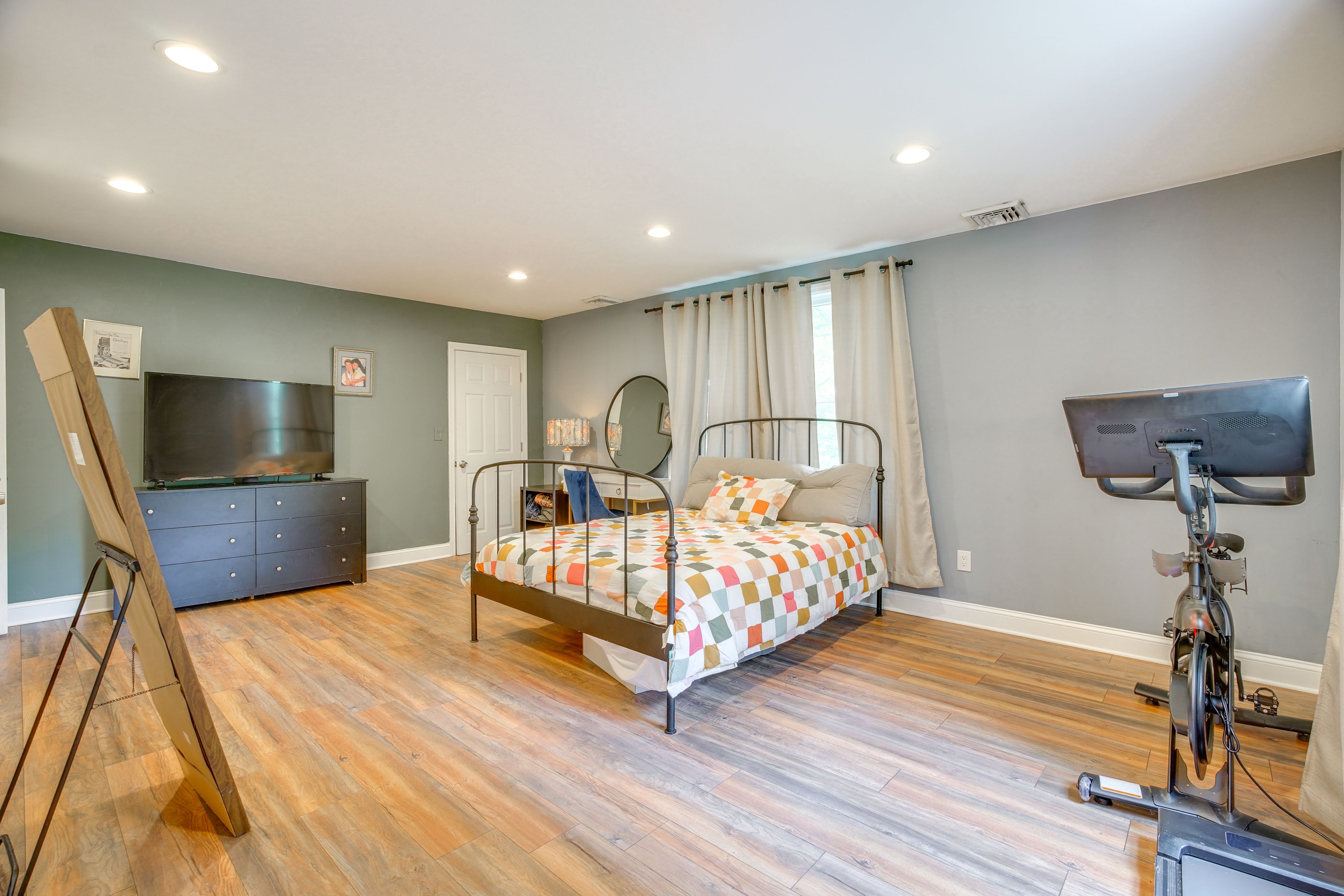Bedroom 1 | Queen Bed | Smart TV | Peloton Bike | 2nd Floor