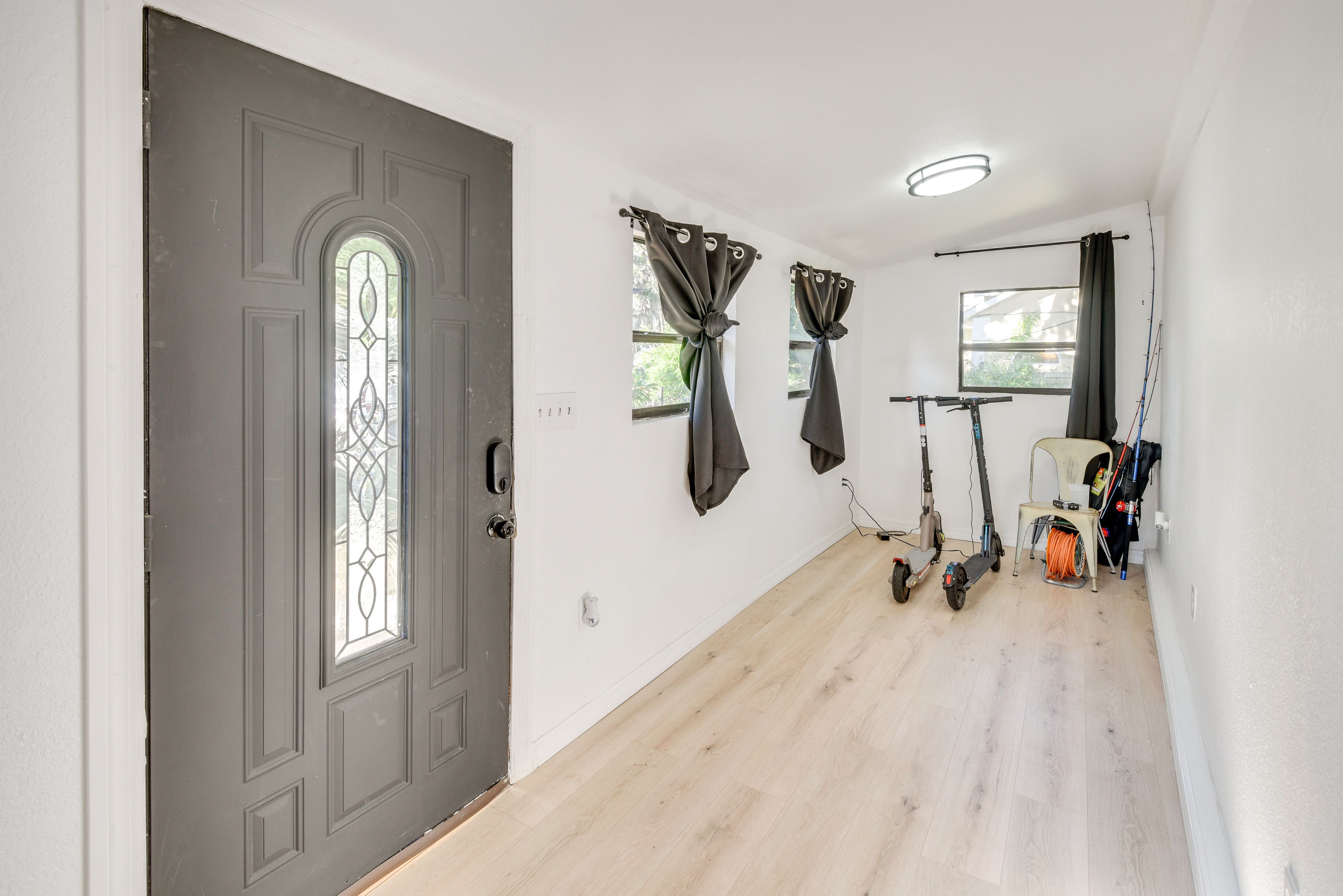Foyer | 2 Adult Scooters | Fishing Poles