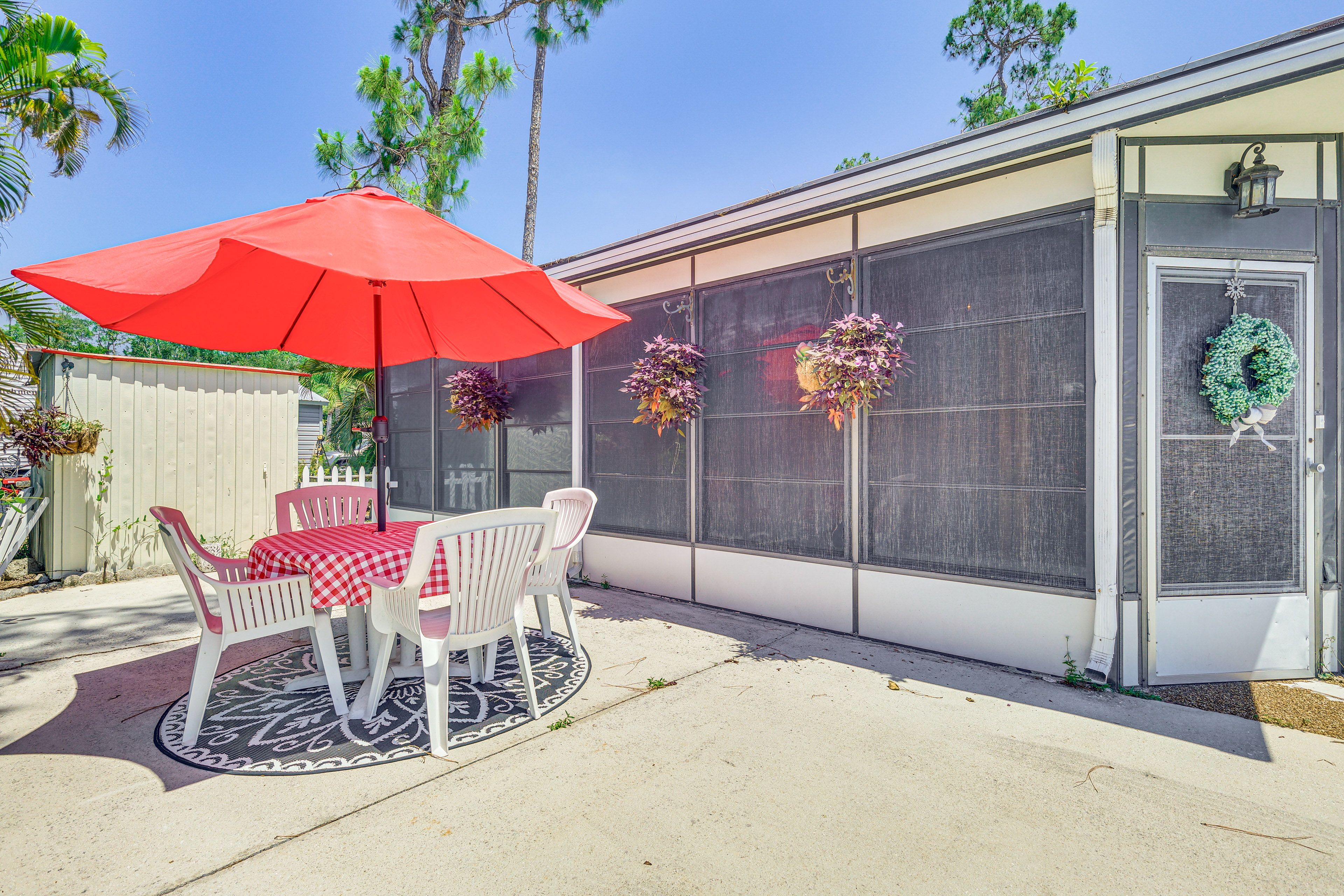 Property Exterior | 2-Story Cottage | Outdoor Dining Table | Charcoal Grill