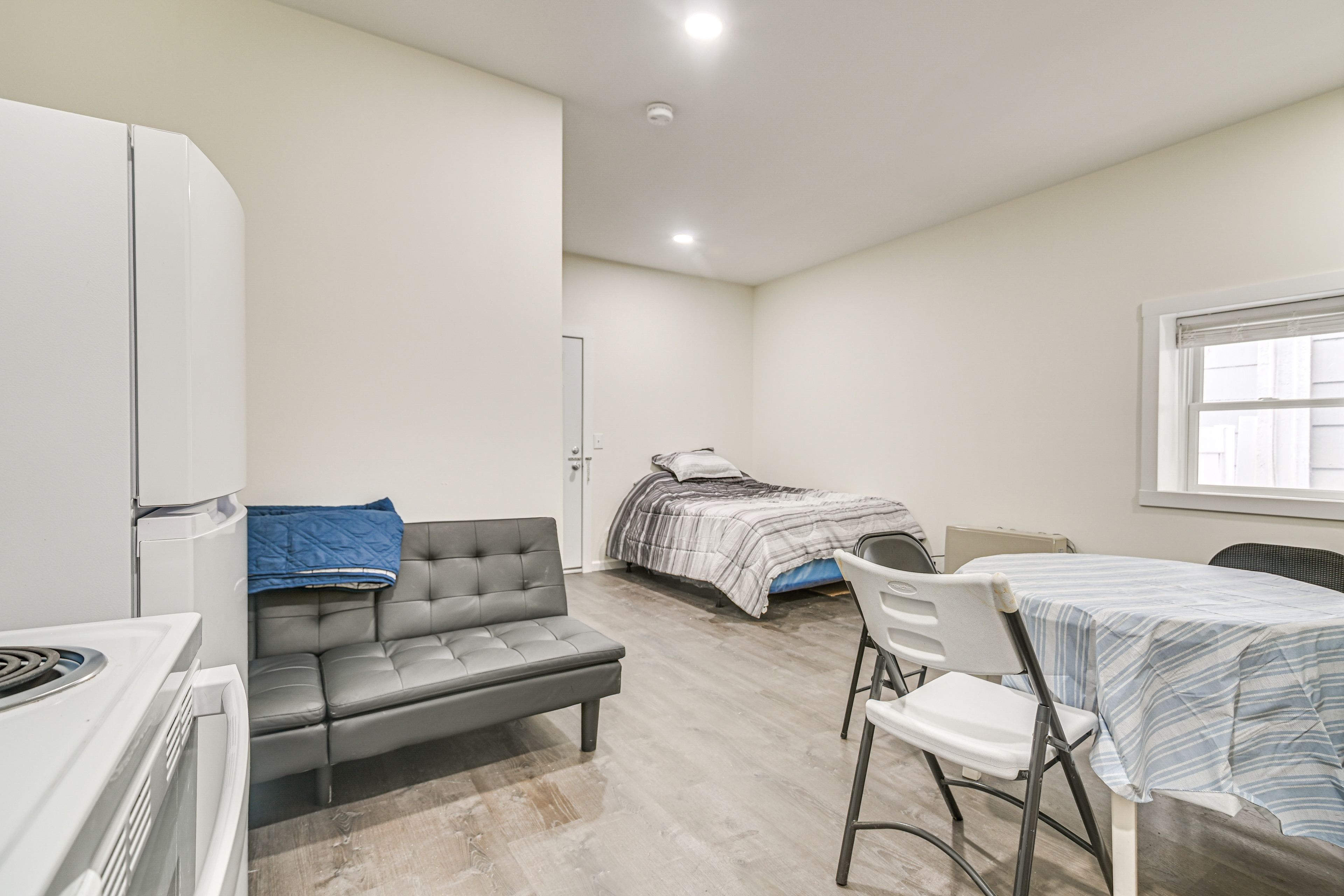 Studio | Living Space | Full Futon | Free WiFi | Window A/C Unit (Summer Only)