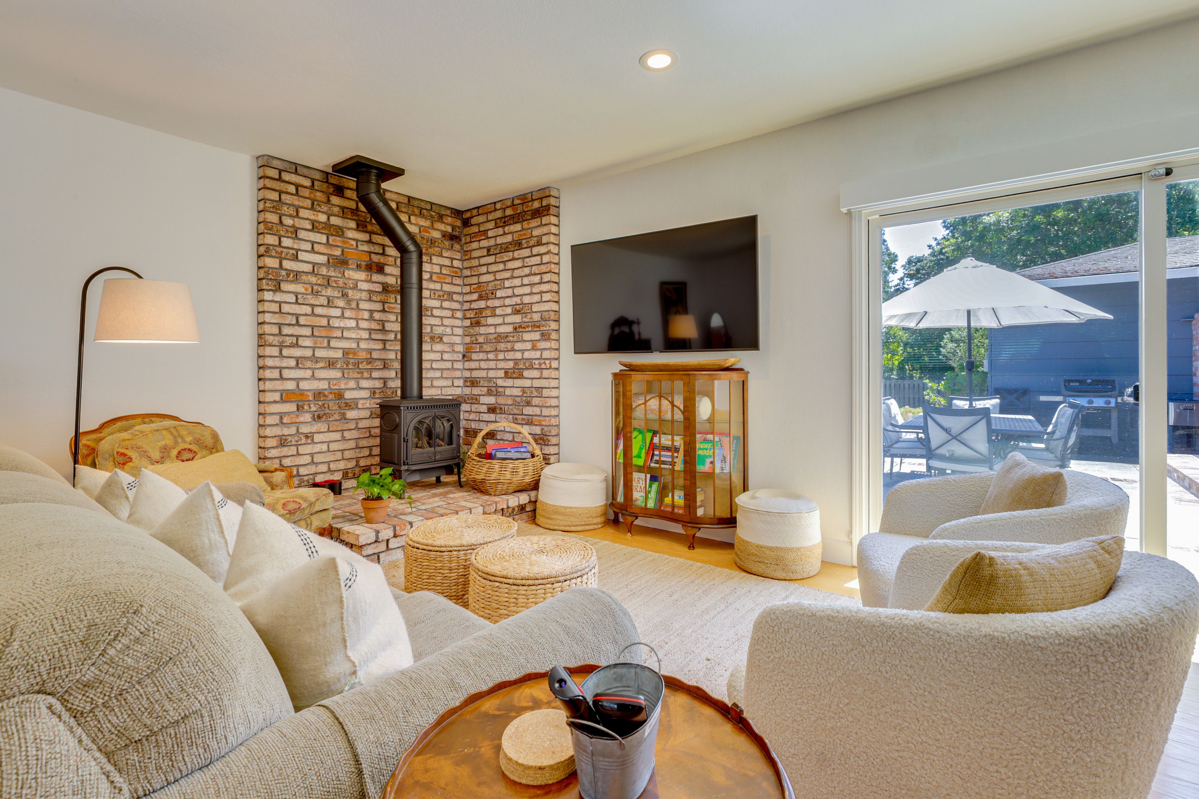 Living Room | Queen Sleeper Sofa | Wood-Burning Stove | Stationary Bike