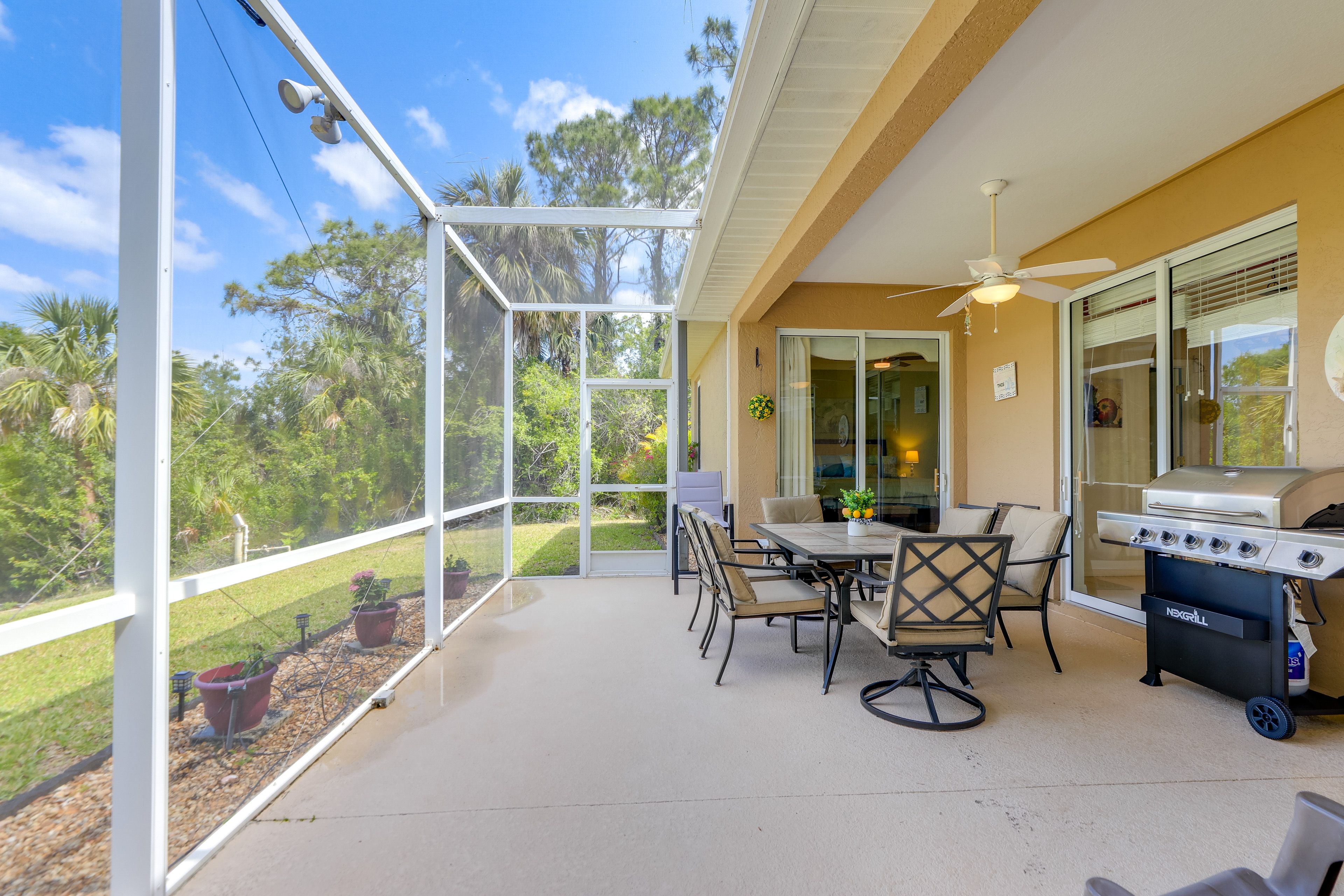 House Exterior | Screened Patio | Dining Area | Gas Grill