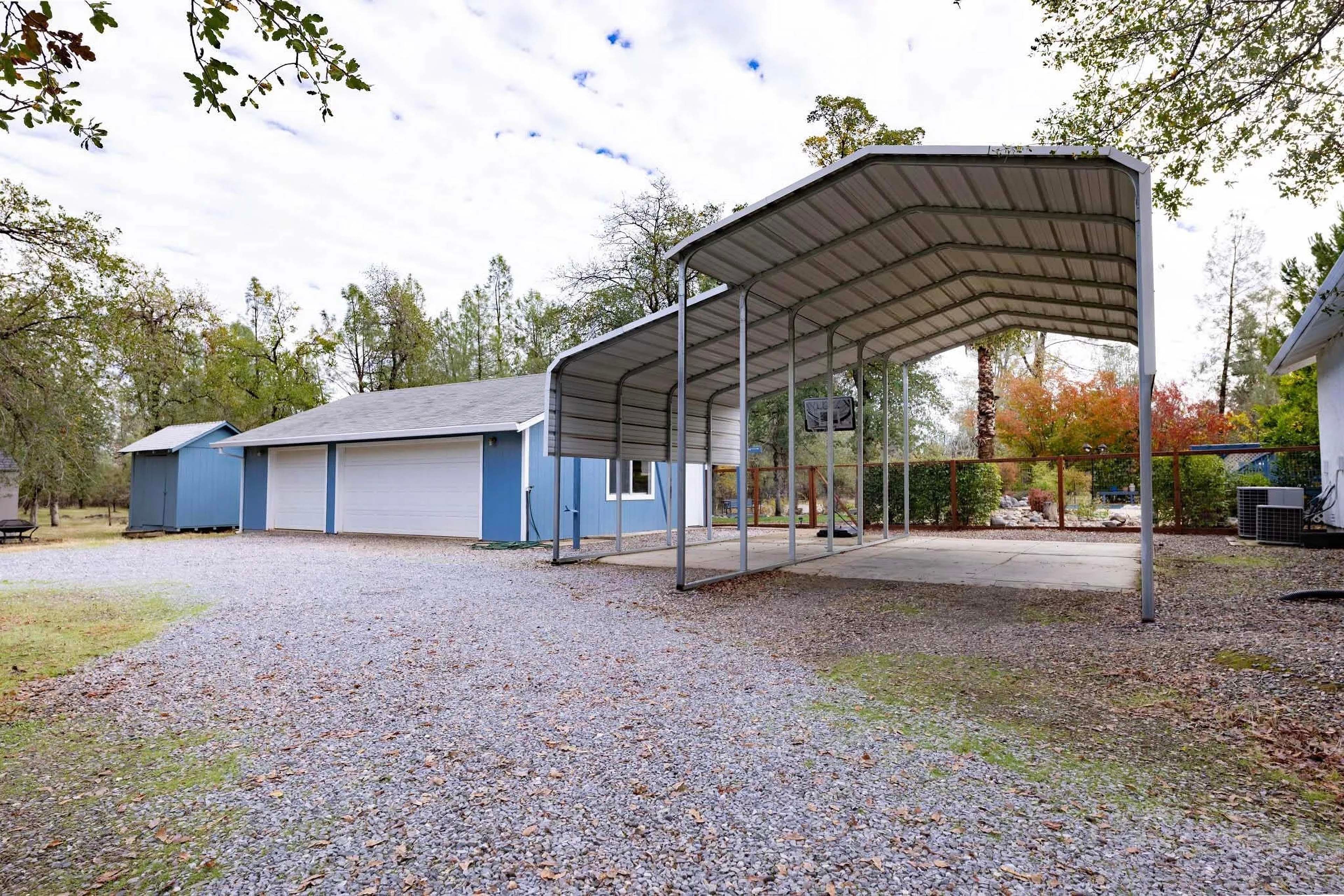 Exterior | Driveway Parking (6 Vehicles) | Covered RV/Trailer/Boat Parking