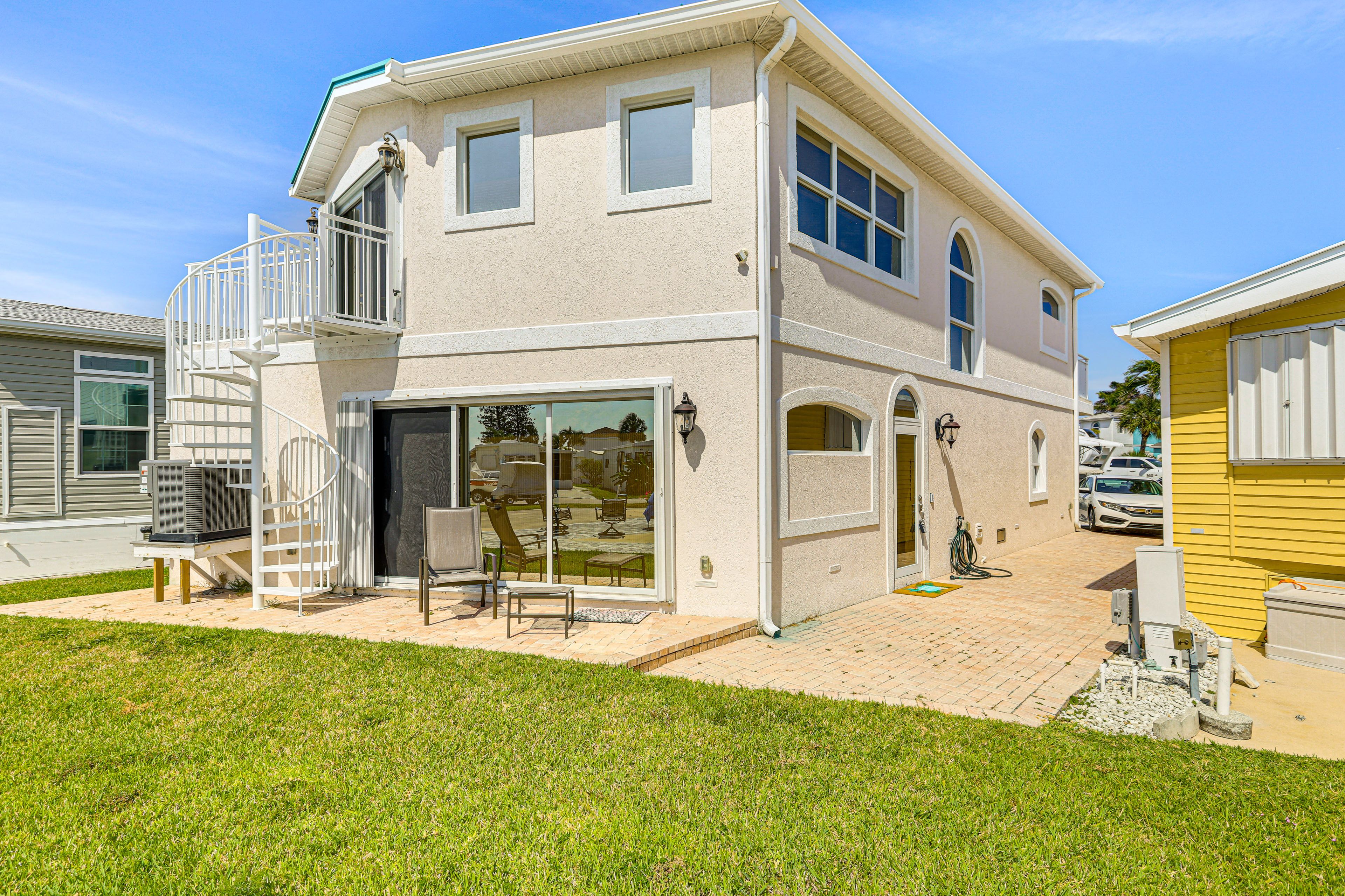 Property Exterior | Patios w/ Seating