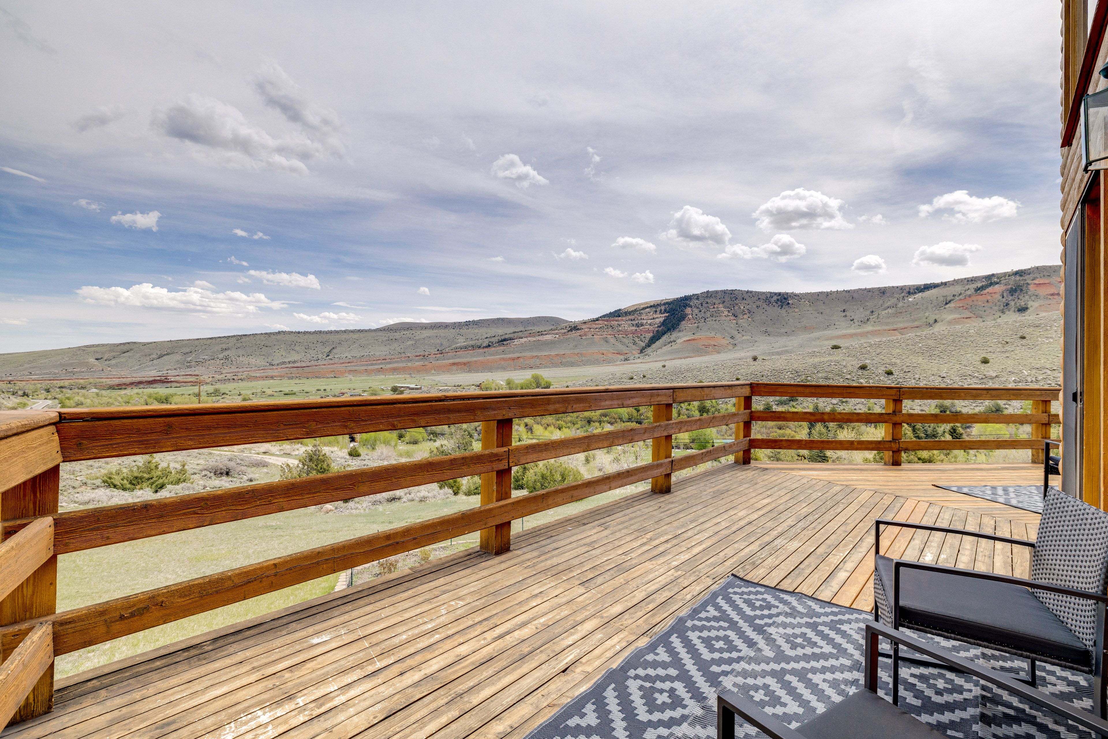 House Exterior | Wraparound Deck w/ Seating | Mountain Views