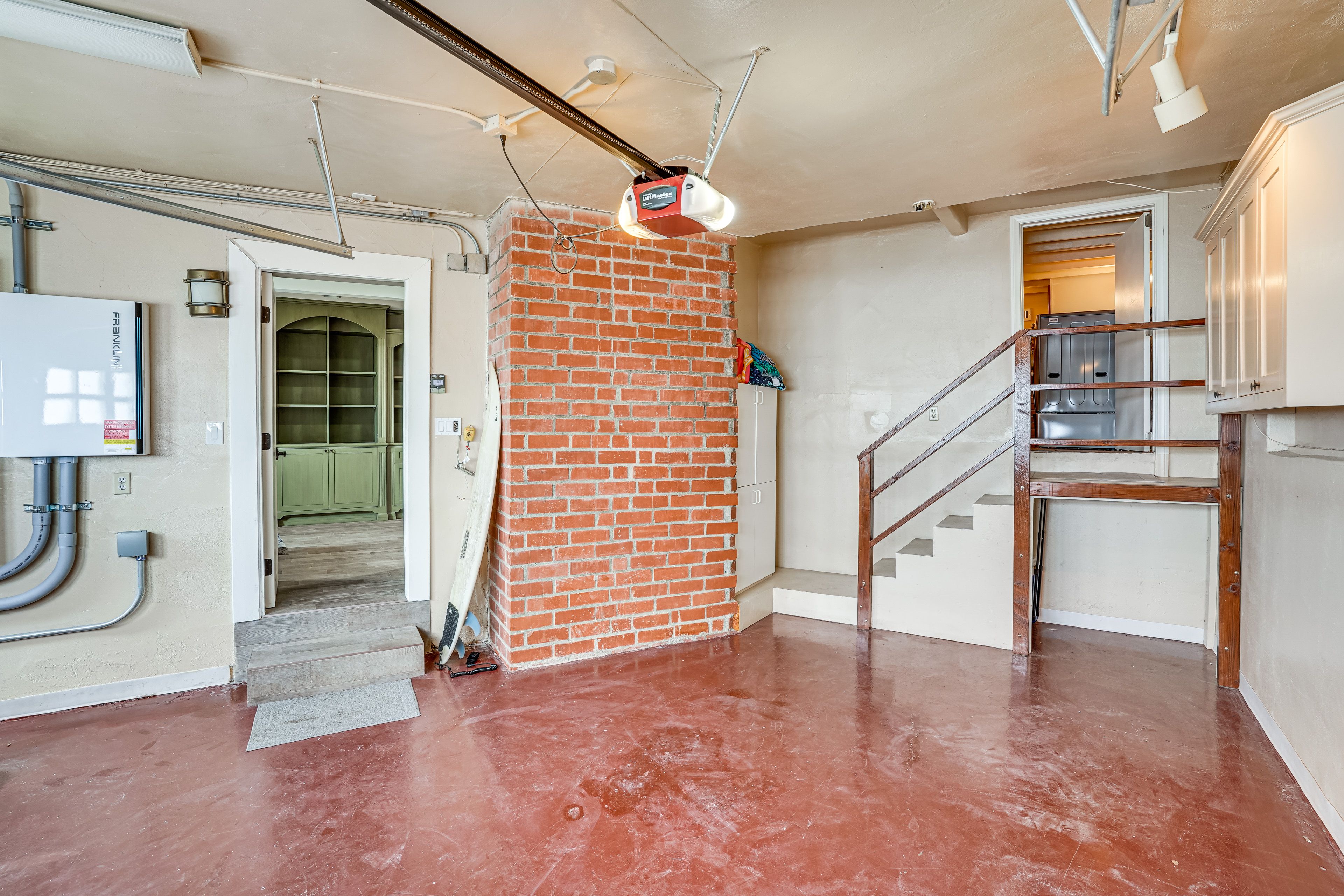 Garage | Lower Level | Parking (1 Vehicle) | 2 Steps to Enter Bedroom 3