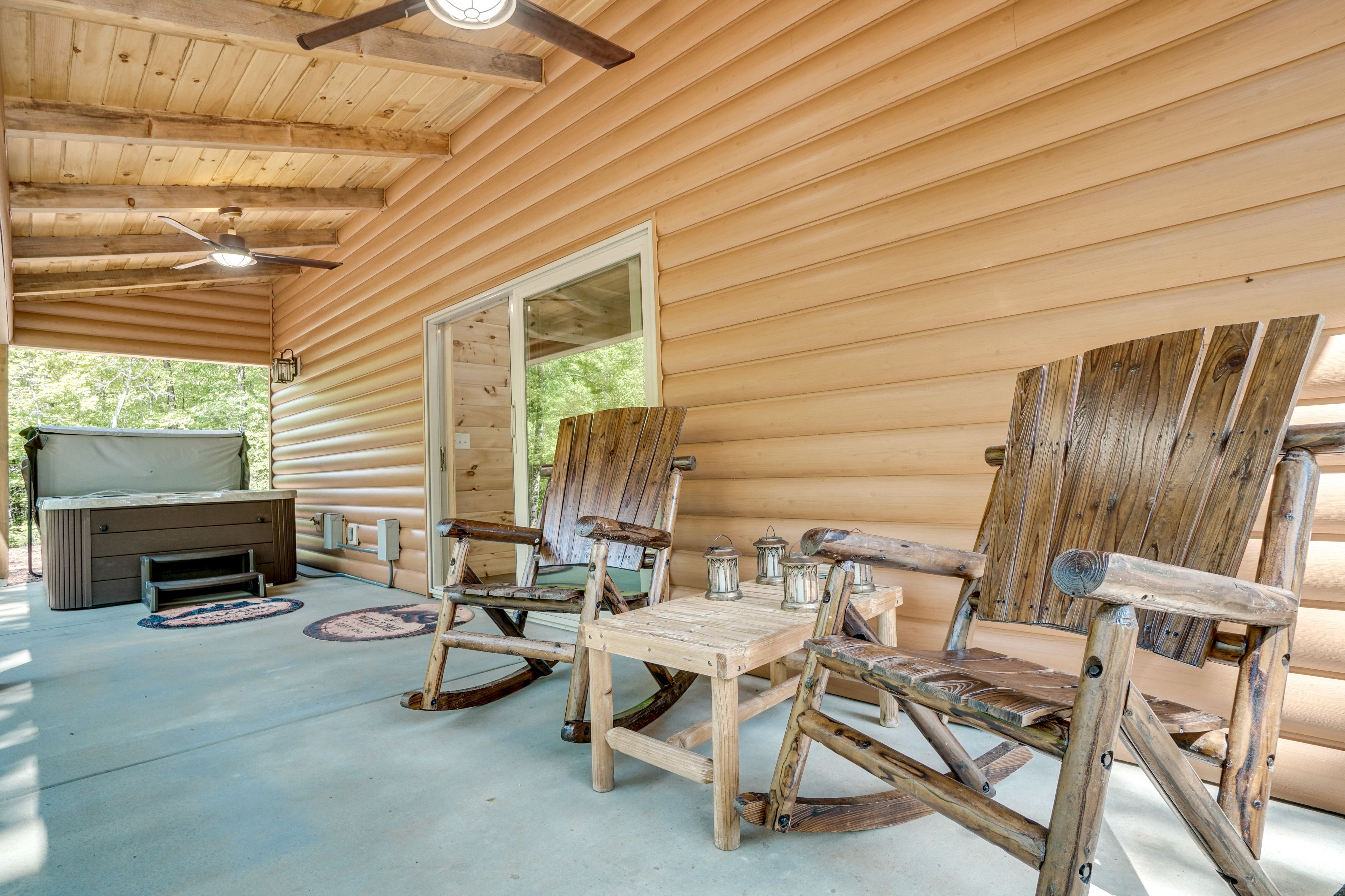 Cabin Exterior | Covered Patio | Private Hot Tub