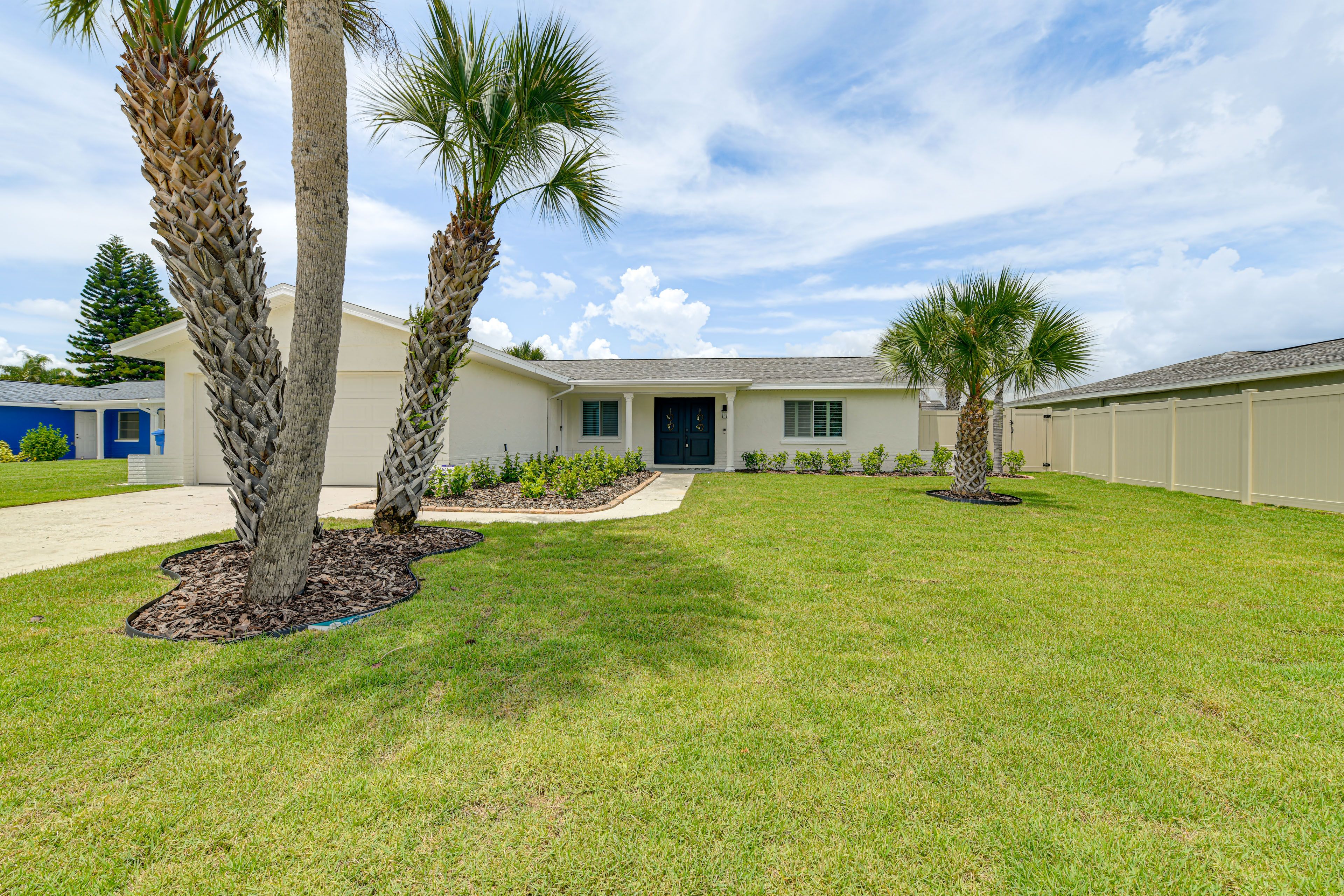 Property Exterior | Single-Story Home | Spacious Yard | Boat Dock