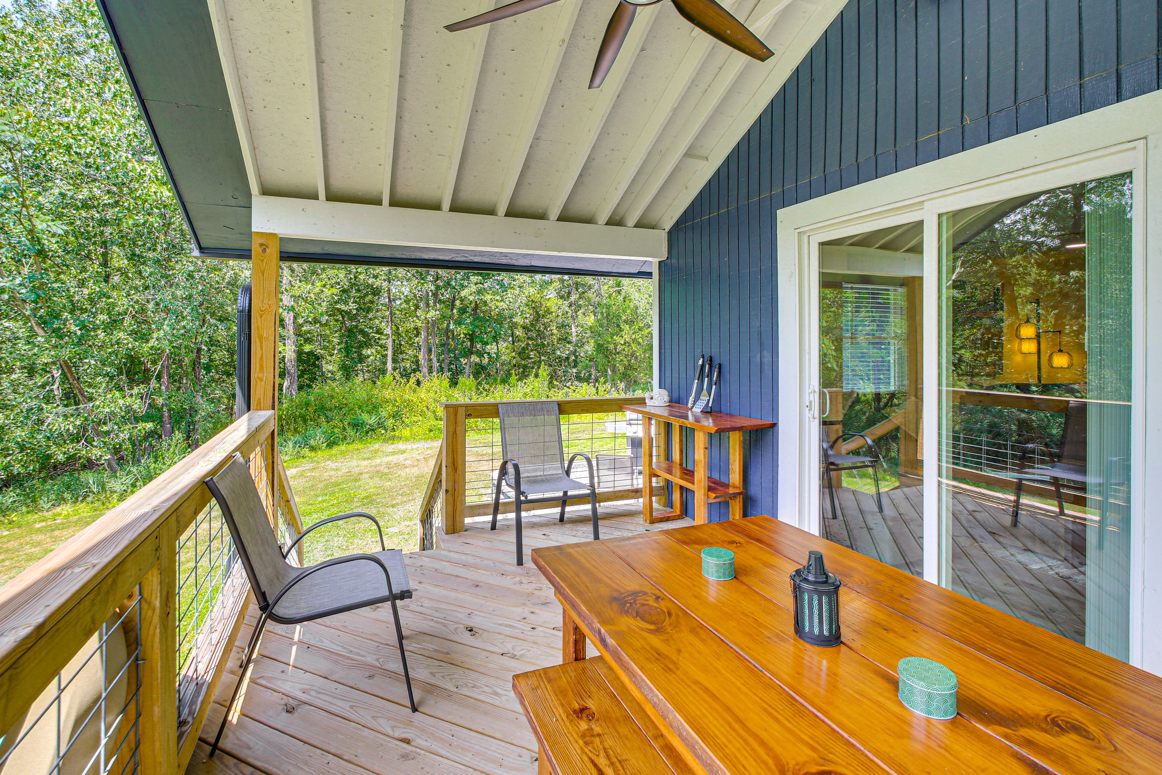 Property Exterior | Gas Grill | Covered Deck w/ Seating | Single-Story Home