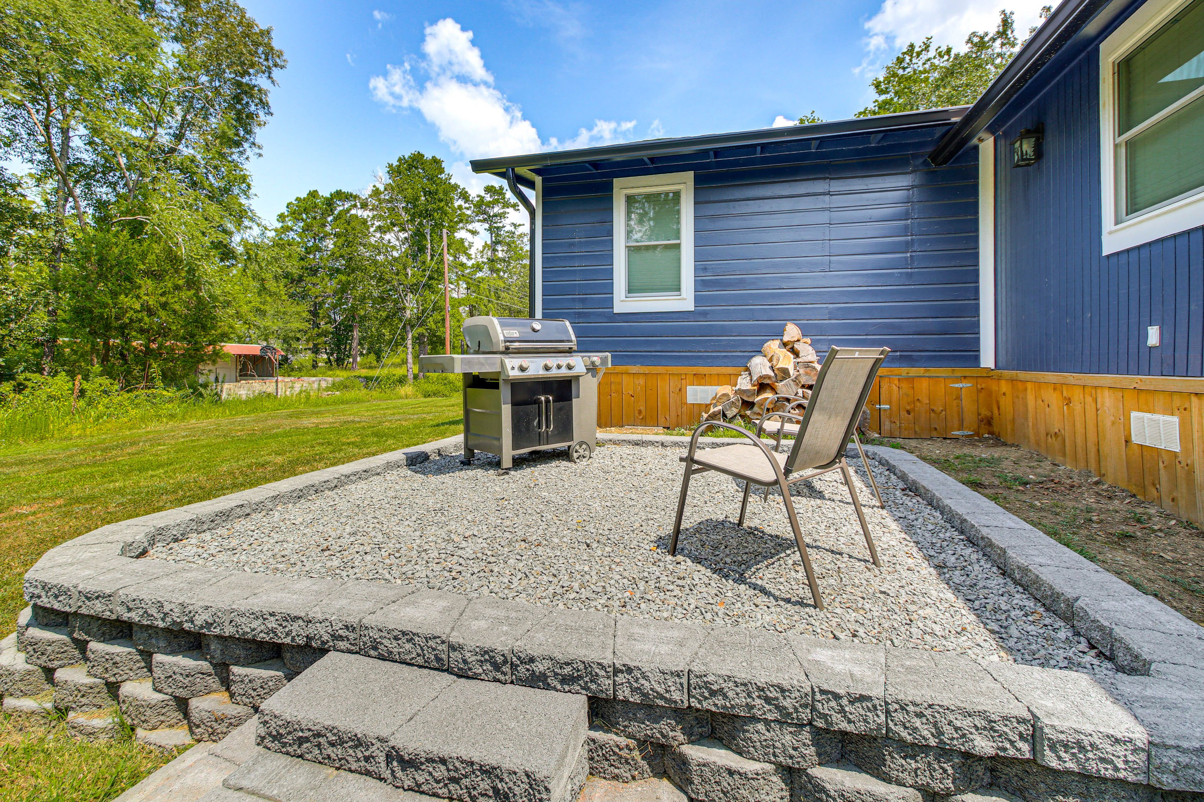 Property Exterior | Gas Grill | Spacious Yard | 2 Kayaks & Life Vests