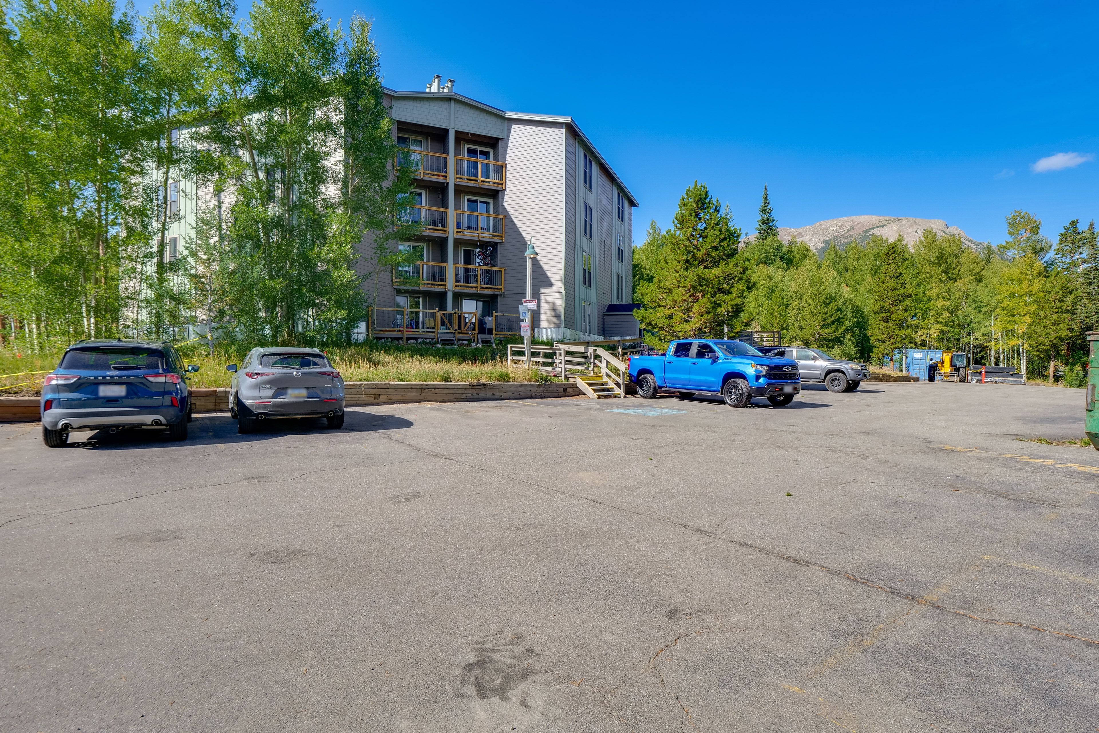 Parking | Community Parking Lot (2 Vehicles; Permit Required w/ No Addt'l Cost)