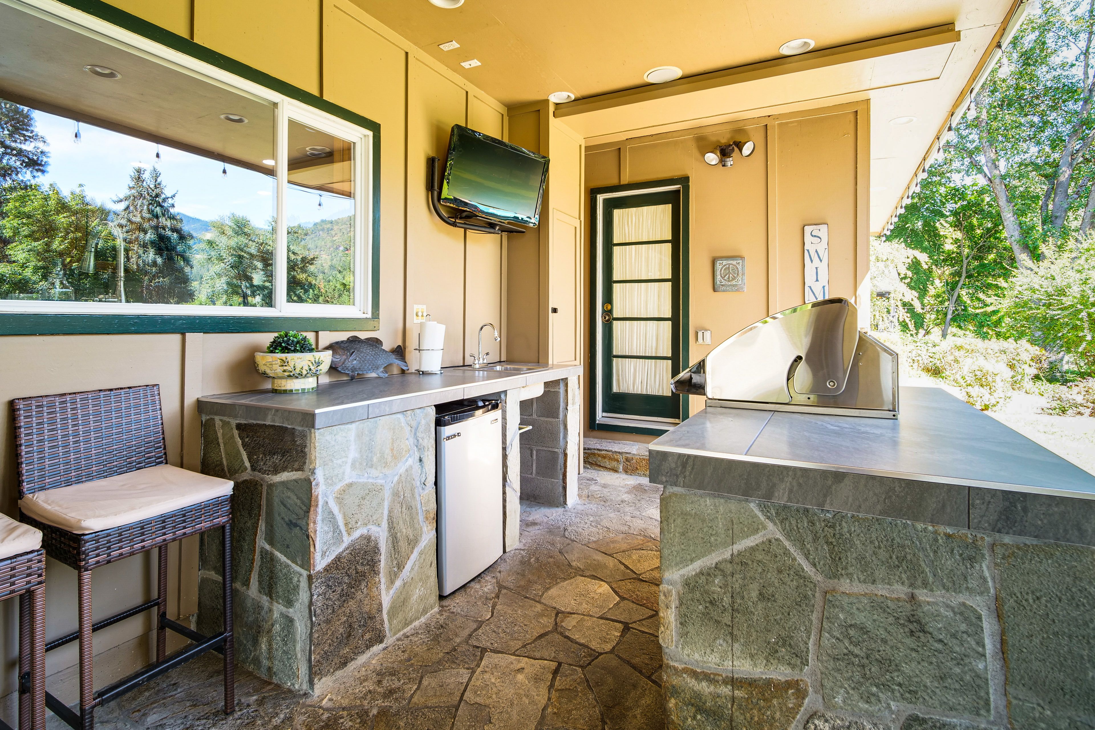 Outdoor Kitchen w/ Pass-Through Windows to Indoor Kitchen