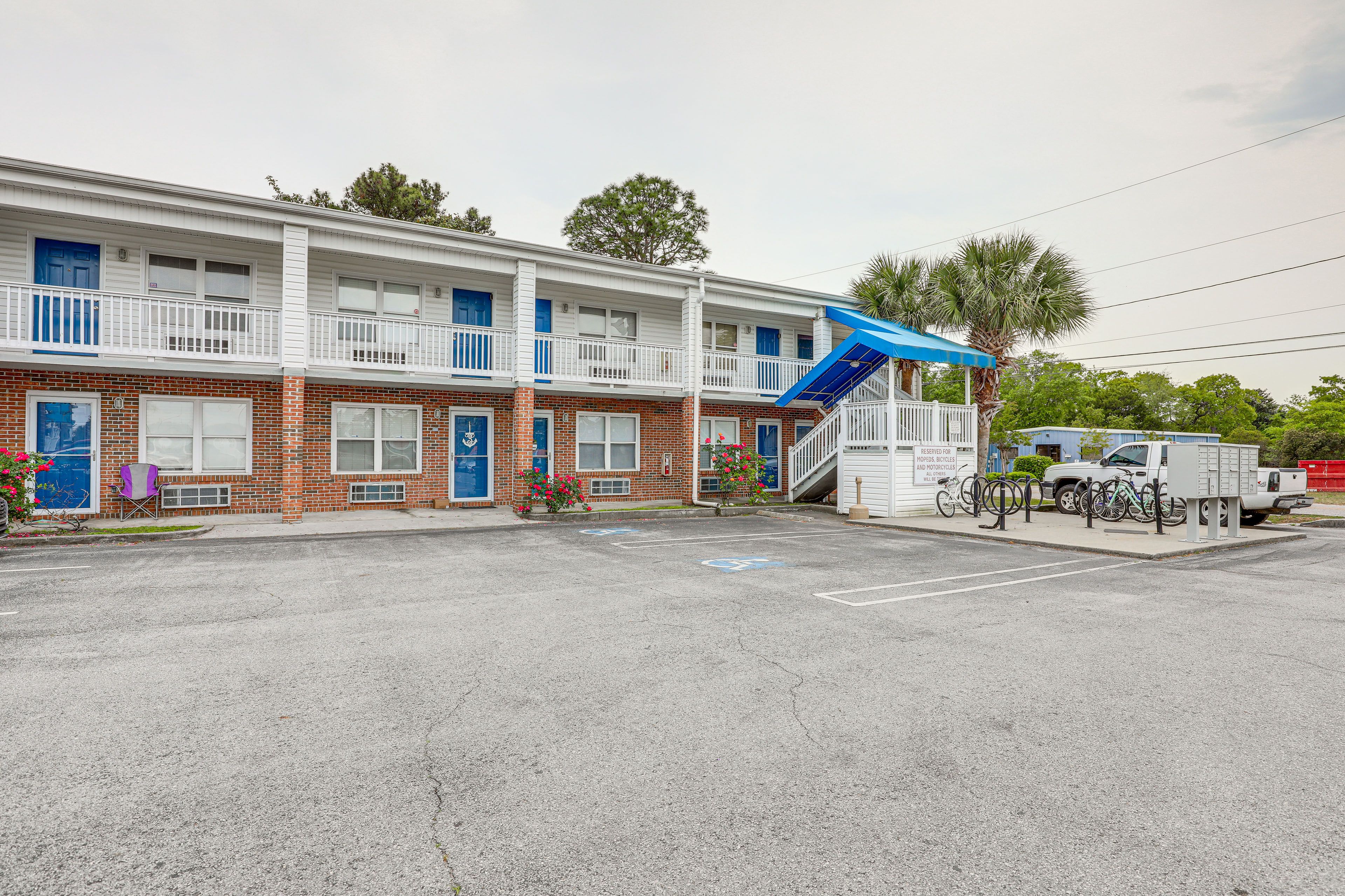 Parking | Community Parking Lot (First-Come, First-Served)
