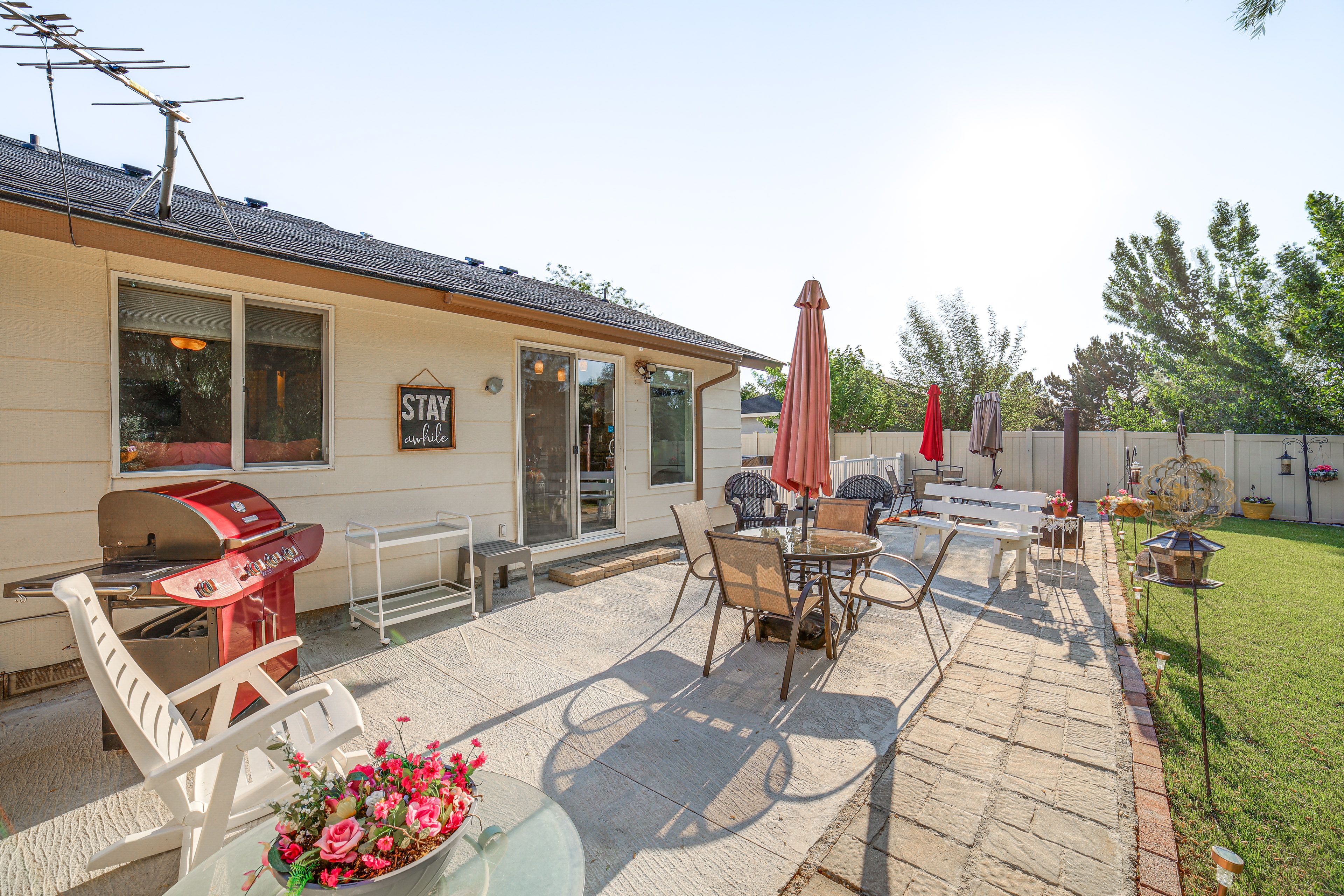Property Exterior | Back Patio (54'x15') | Gas Grill