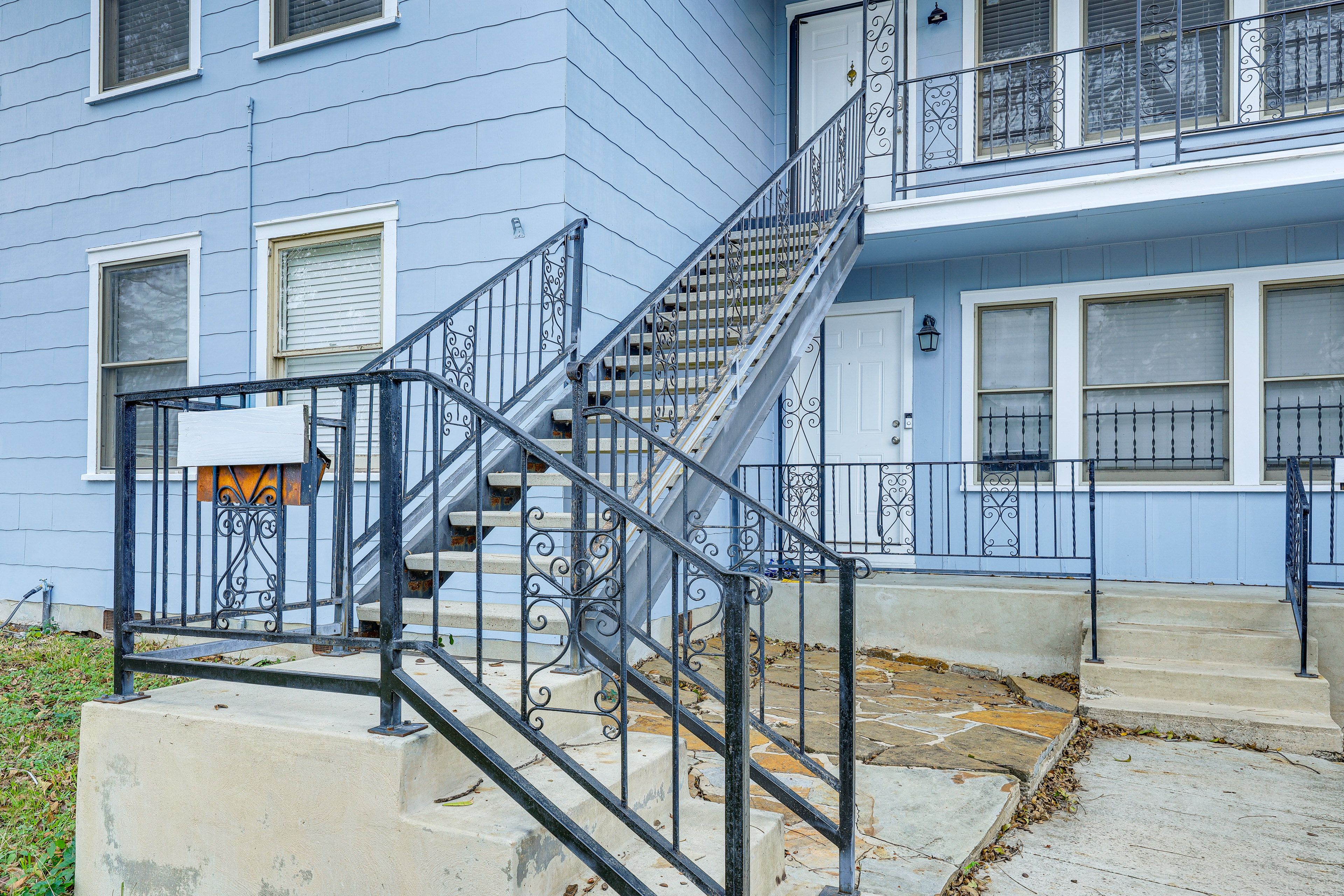 Front Exterior | Stairs to Unit