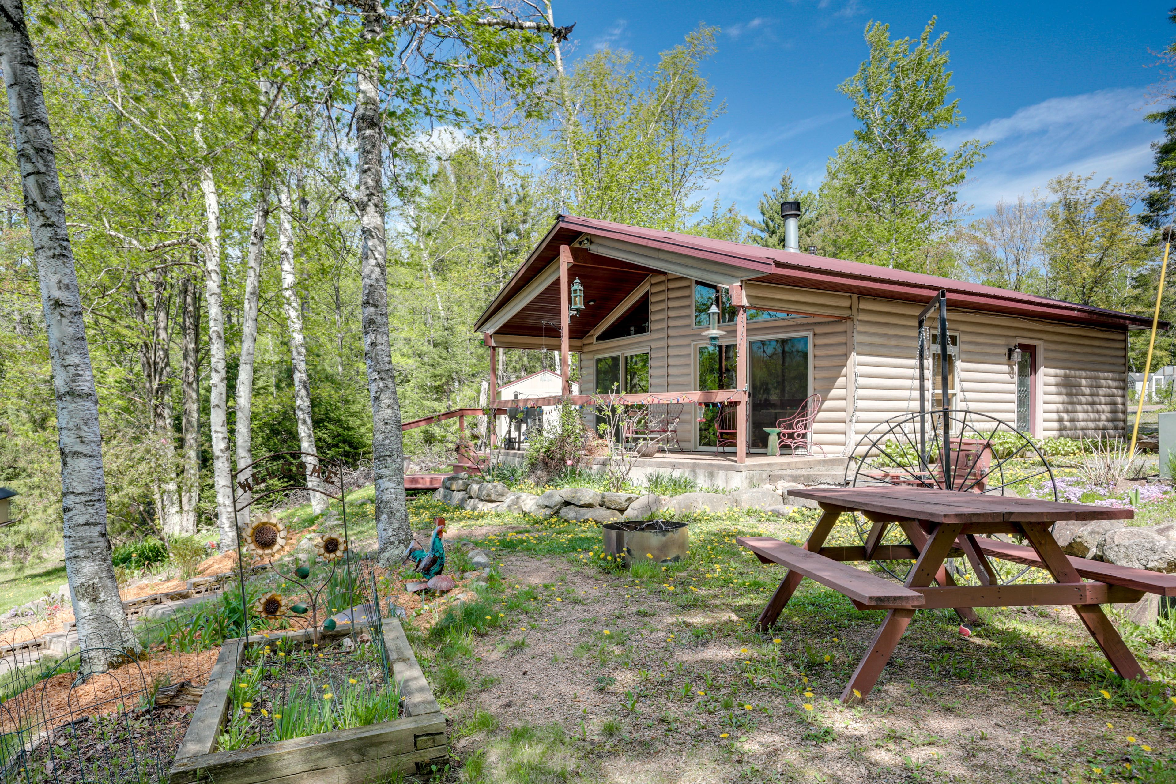 Cabin Exterior | Pellet Grill | Playground | Paddleboard & Kayaks Provided