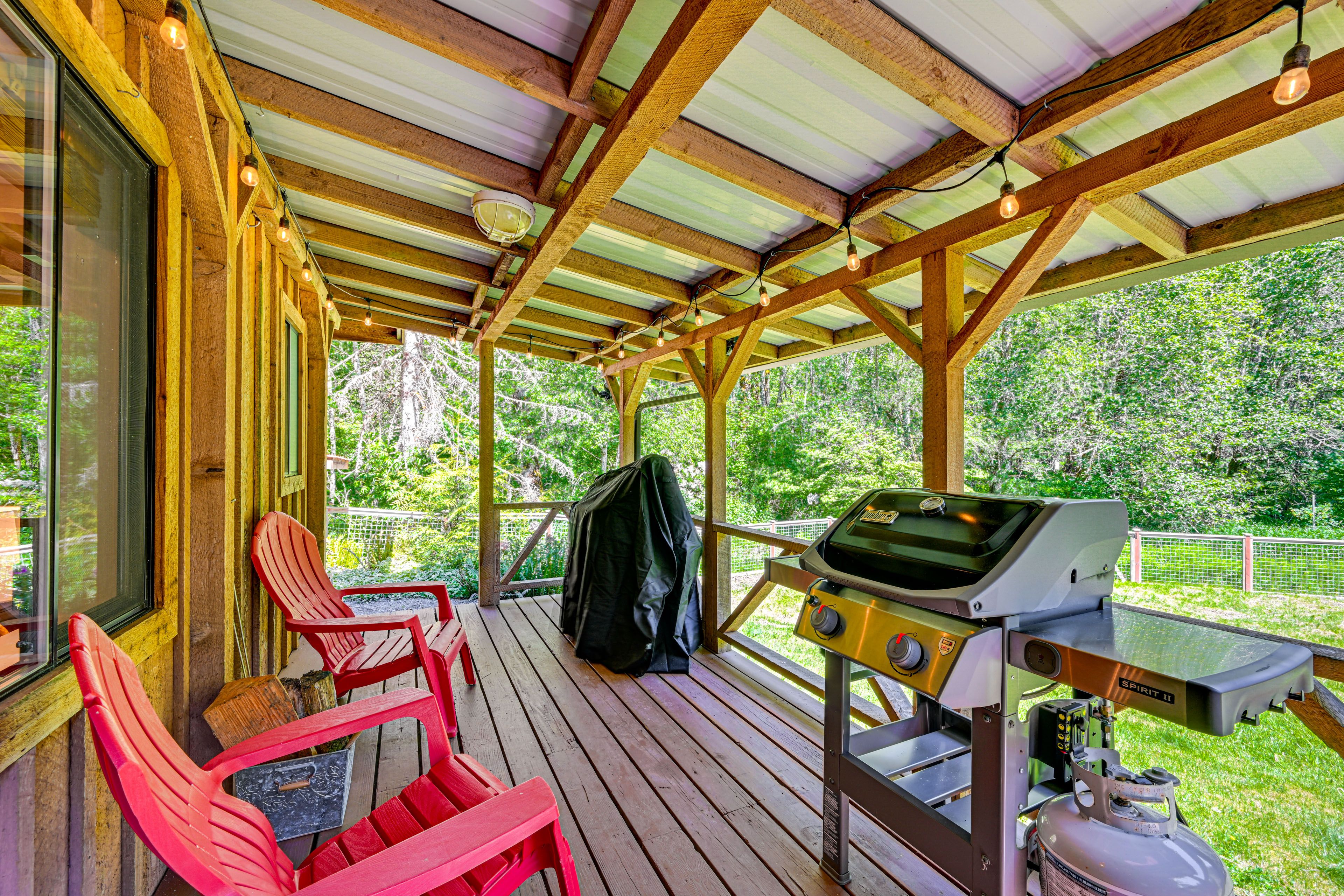 Cabin Exterior | Covered Deck w/ Seating | Gas Grill
