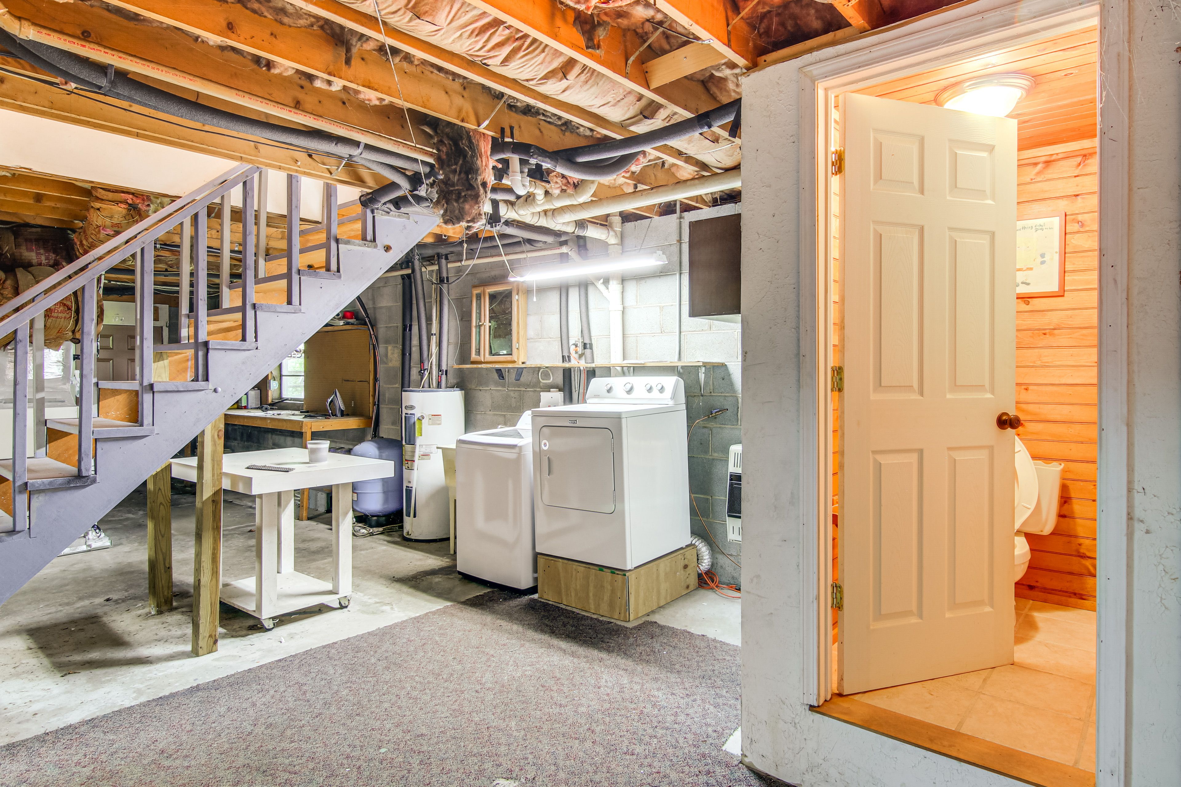 Half Bathroom & In-Unit Laundry | Basement Floor