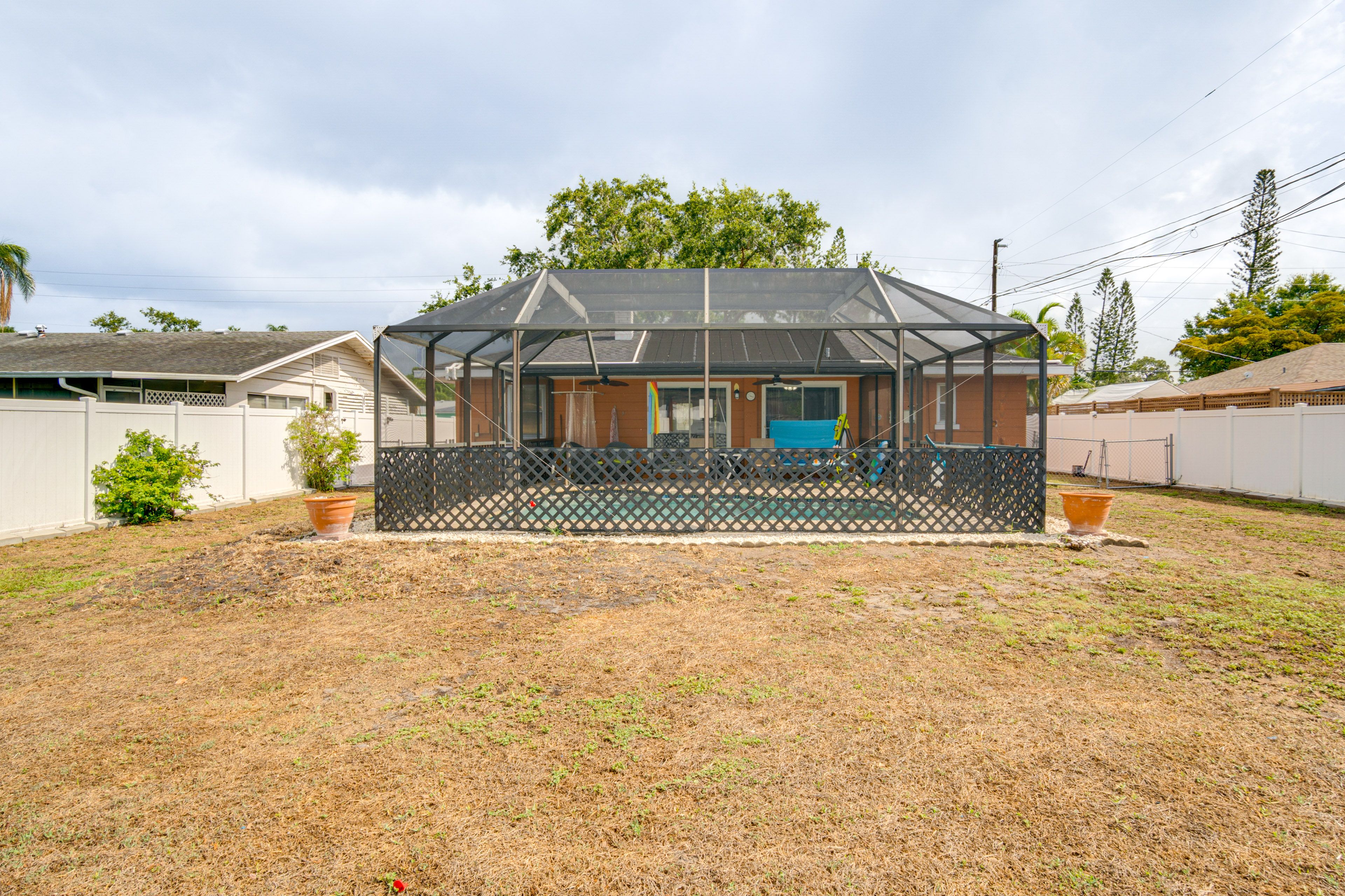 Fenced-In Yard | Screened-In Lanai | Private Pool | Outdoor Shower