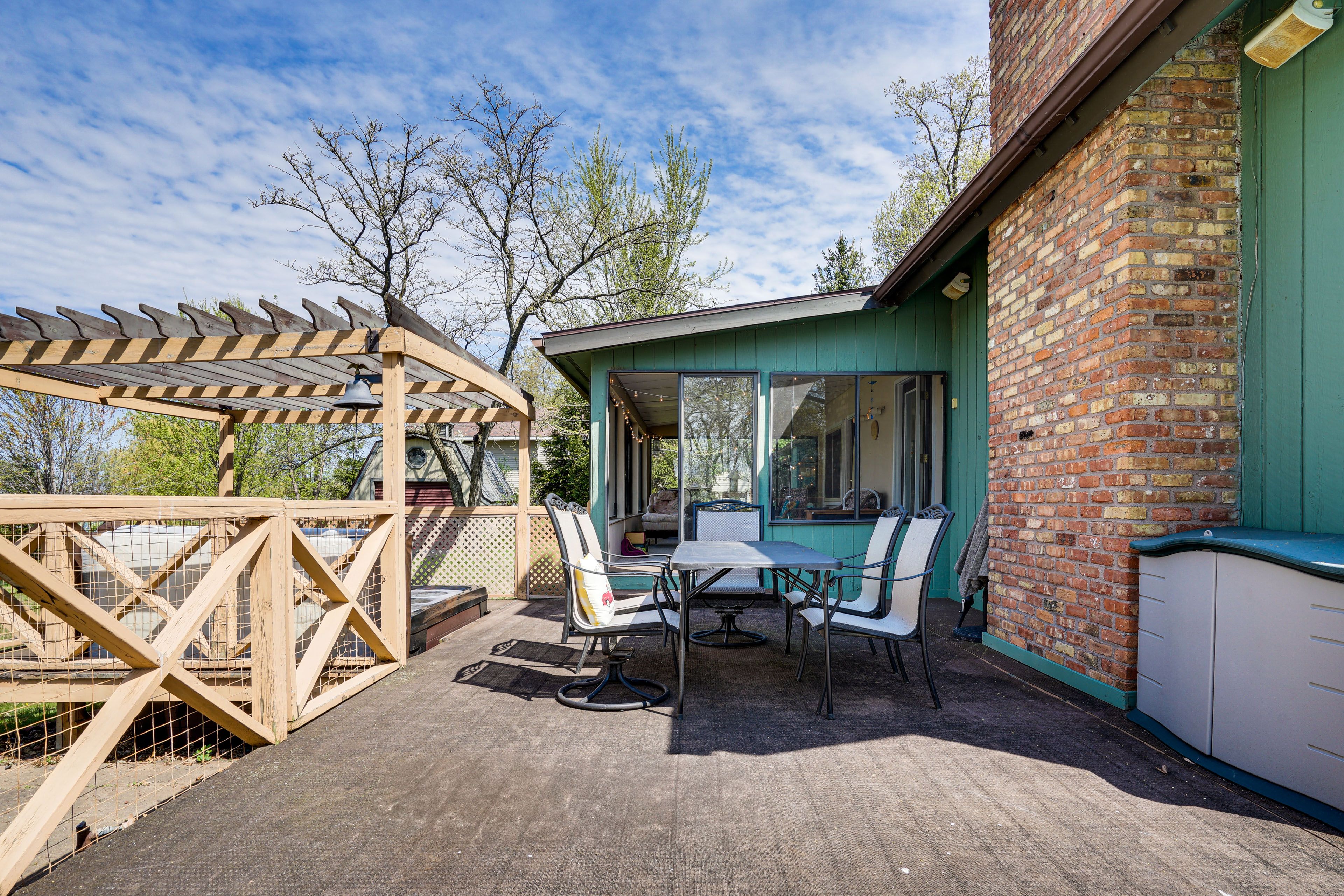 House Exterior | Deck w/ Dining Area | Private Hot Tub