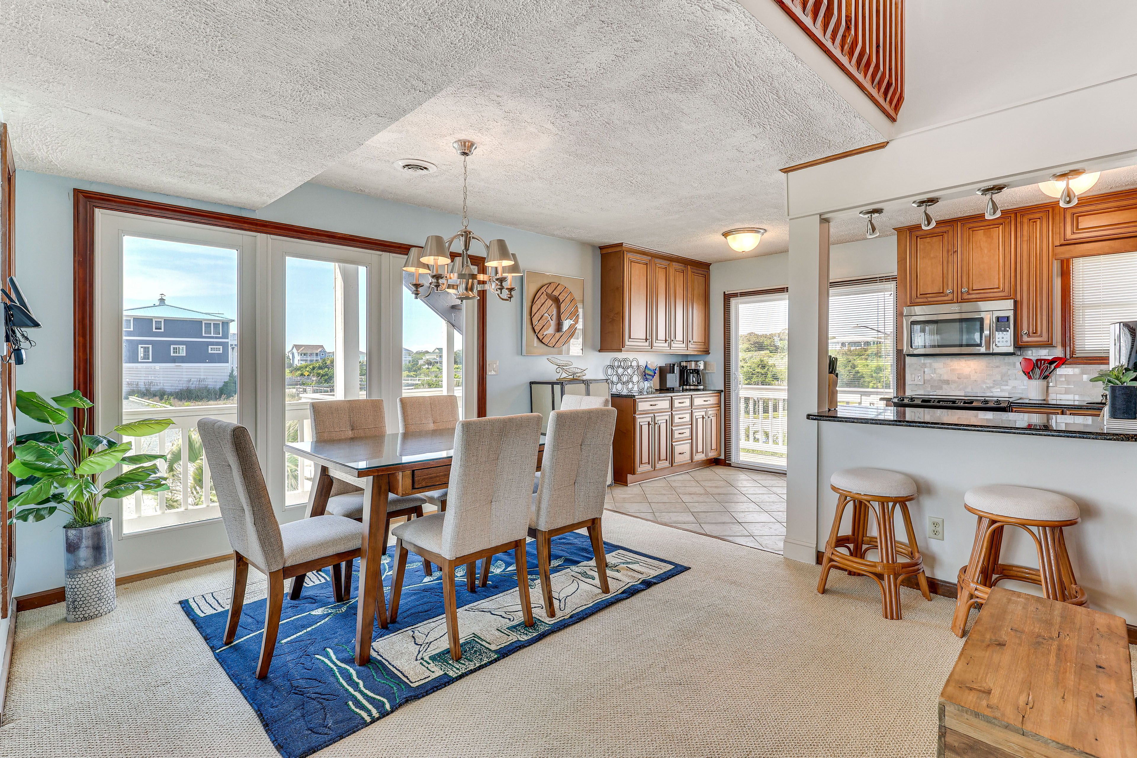 Dining Area | Dishware & Flatware | Central A/C & Heat | 1st Floor