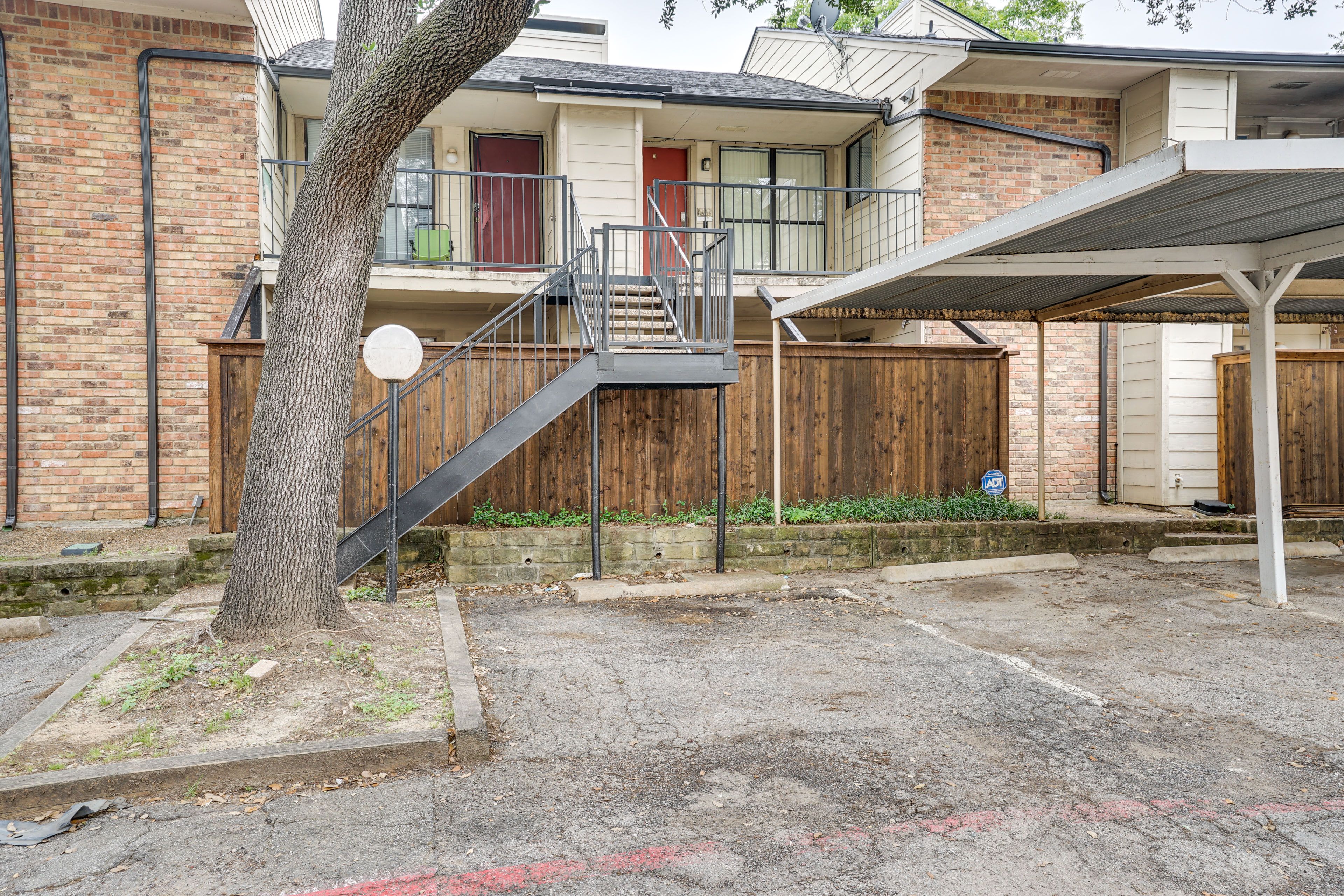 Condo Exterior | Parking | Designated Spot (1 Vehicle)