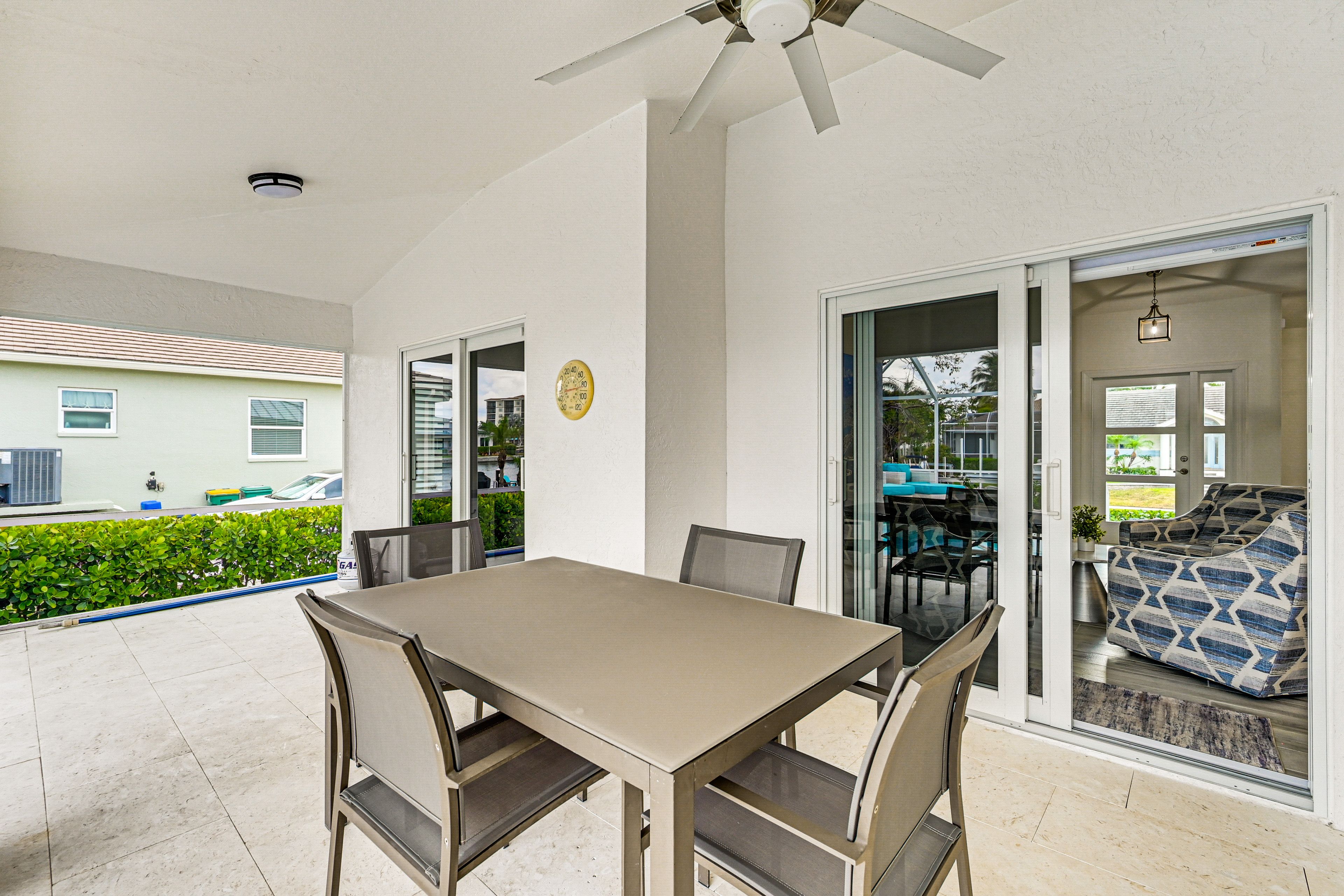 Private Patio | Screened-In Pool | Dining Area