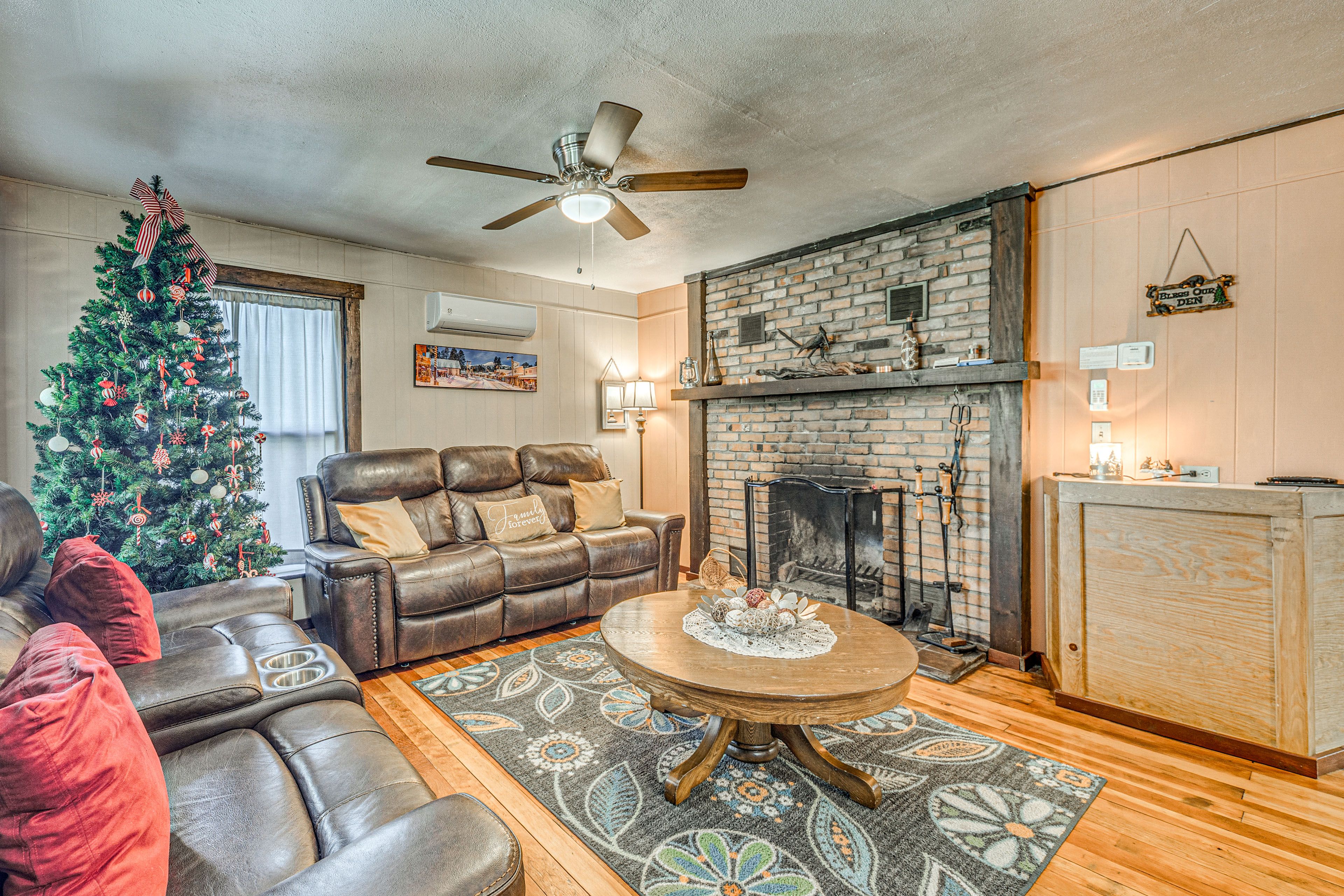 Living Room | Wood-Burning Fireplace | In-Unit Laundry