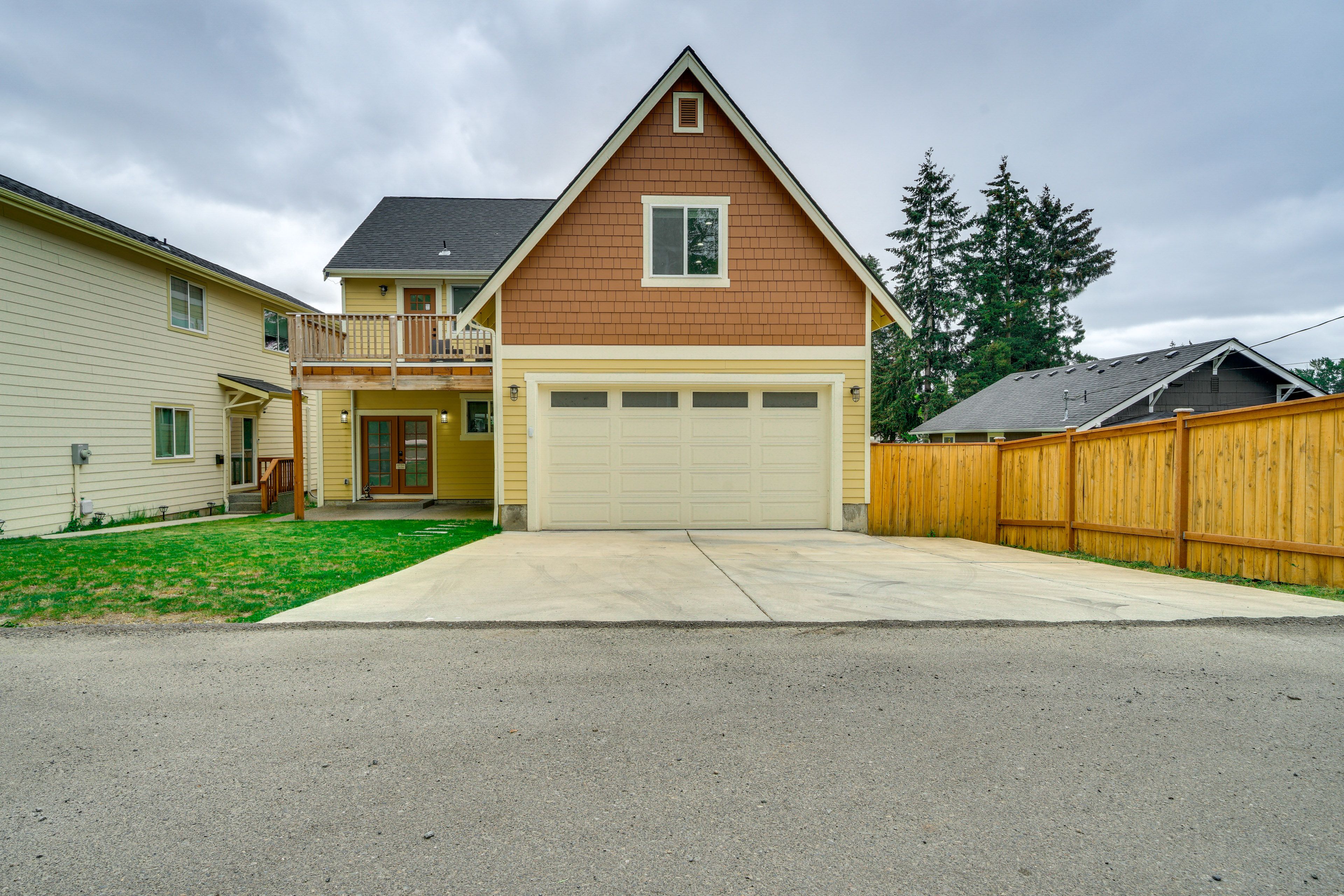 Property Exterior | Balcony w/ Seating | Spacious Yard