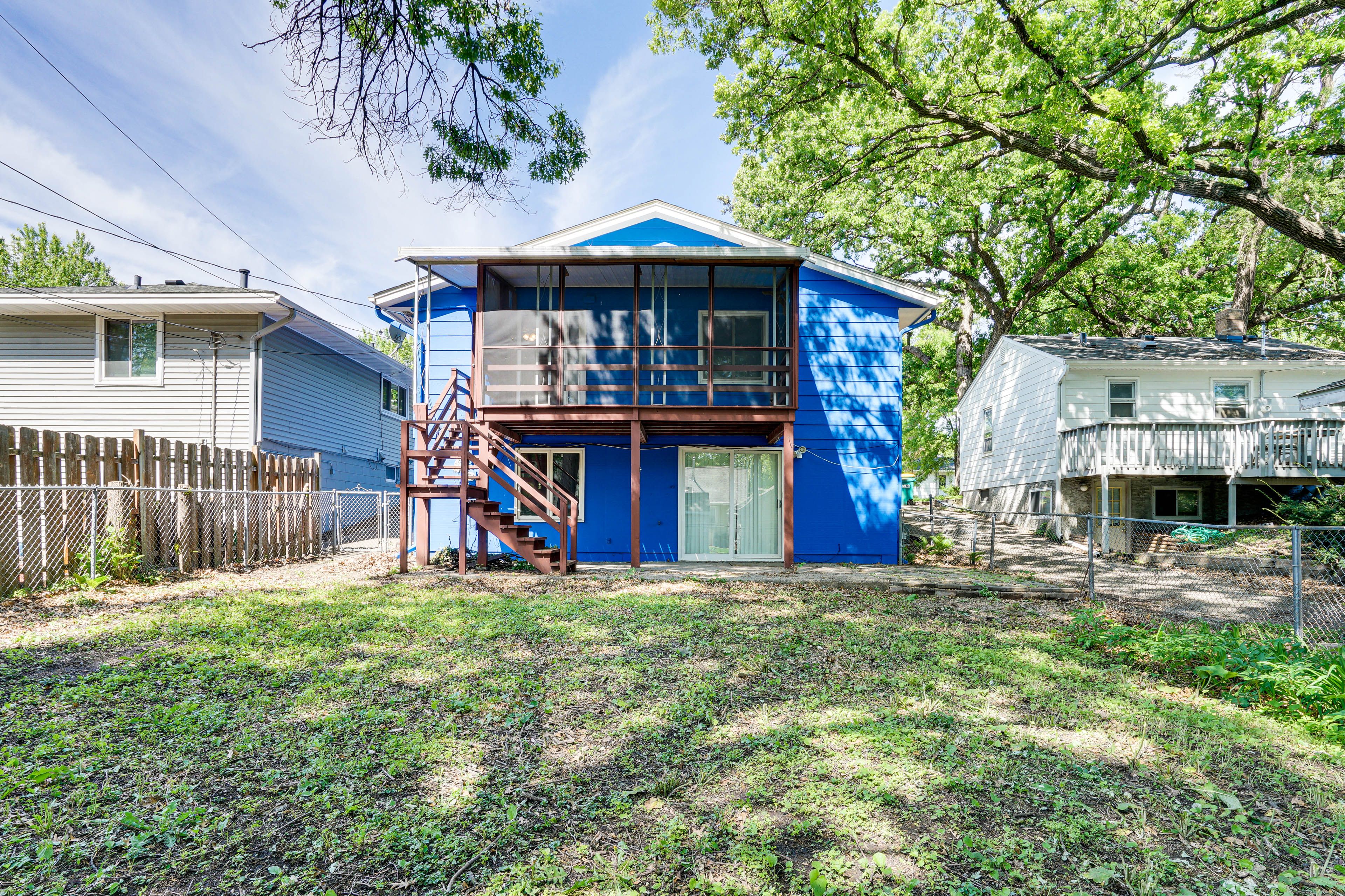 Property Exterior | Fenced-In Yard | Screened-In Porch
