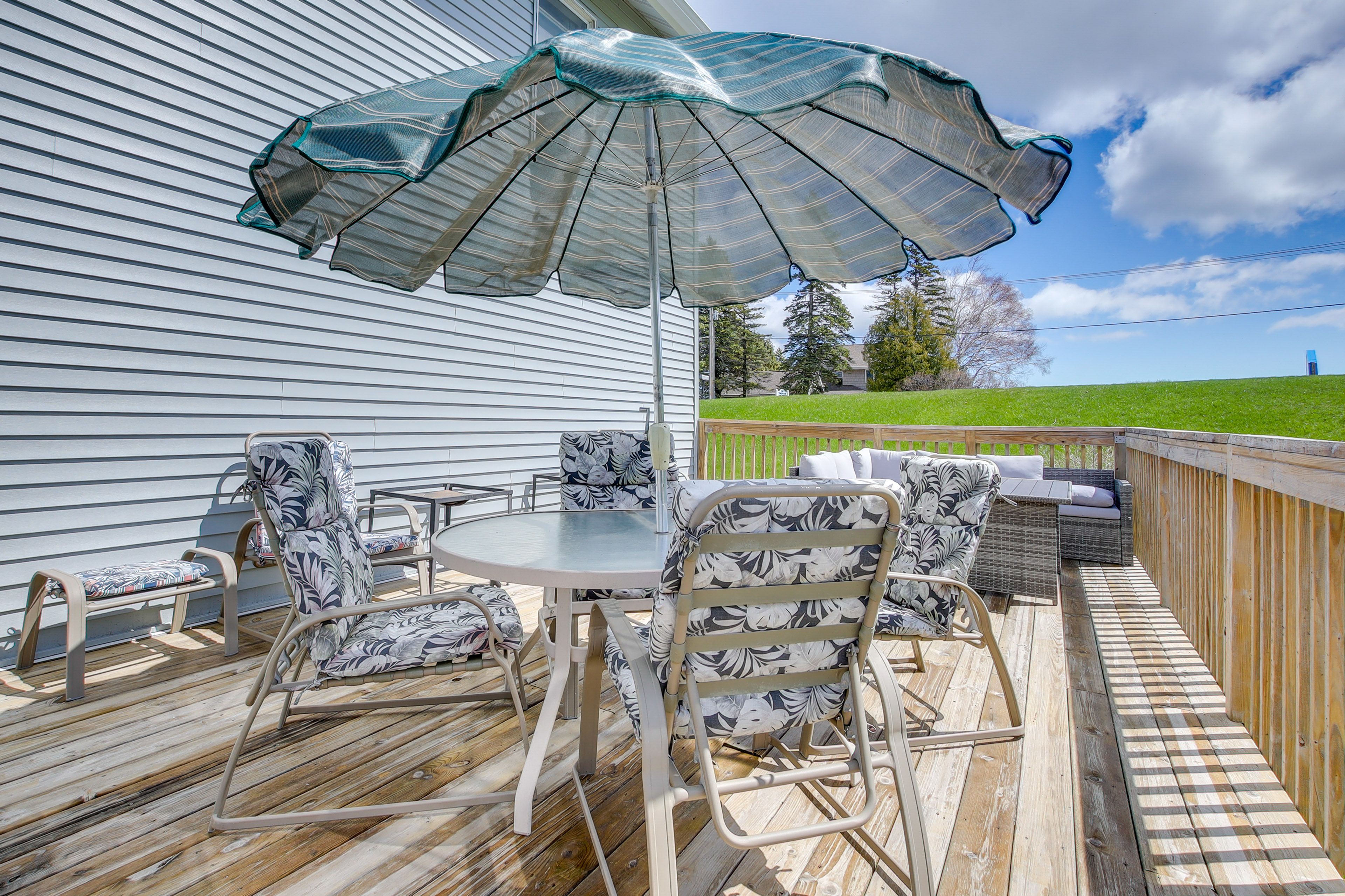 Deck | 2 Outdoor Dining Areas | Lounge Seating