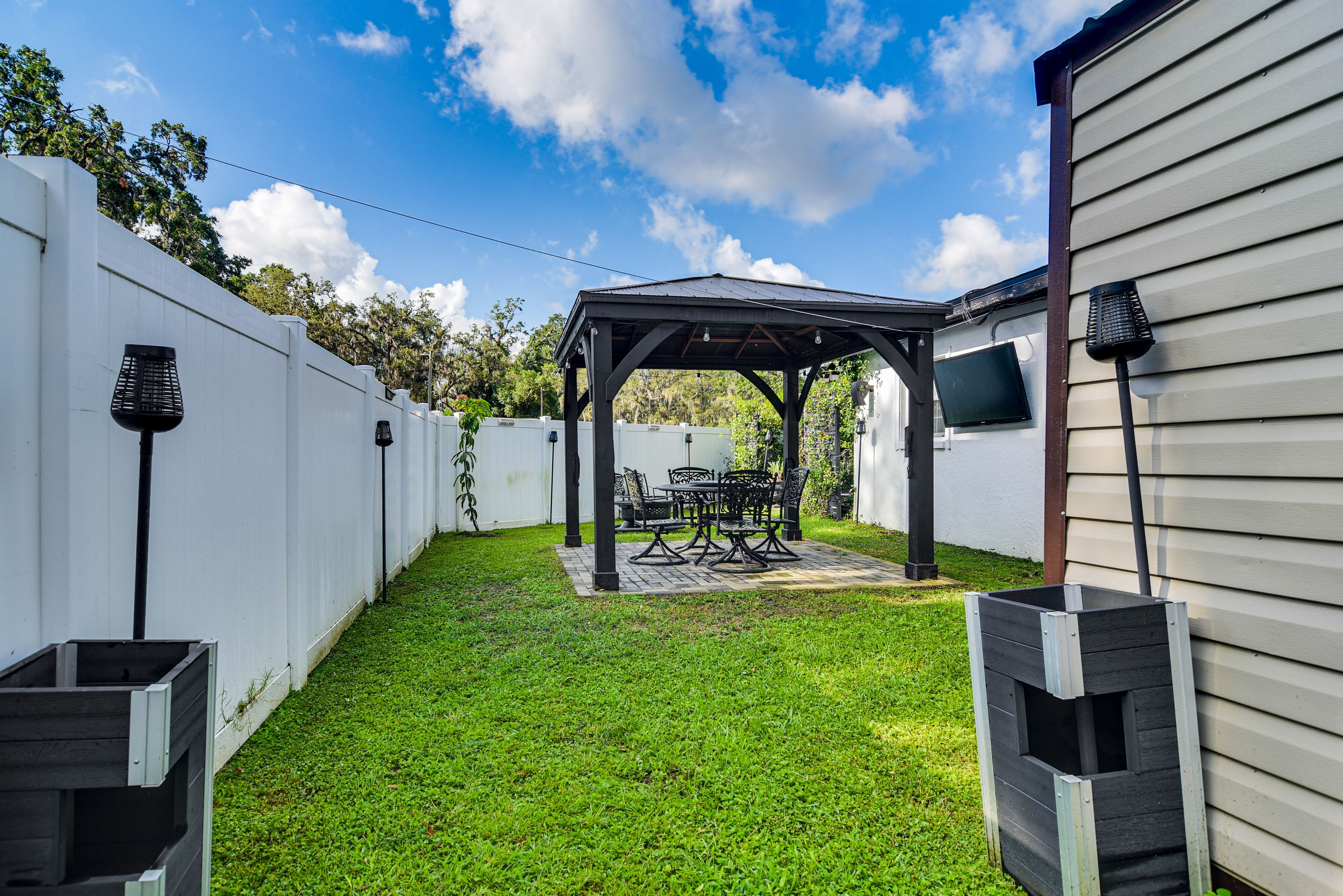 Fenced Backyard | Gazebo w/ Dining Area & TV | Fire Pit