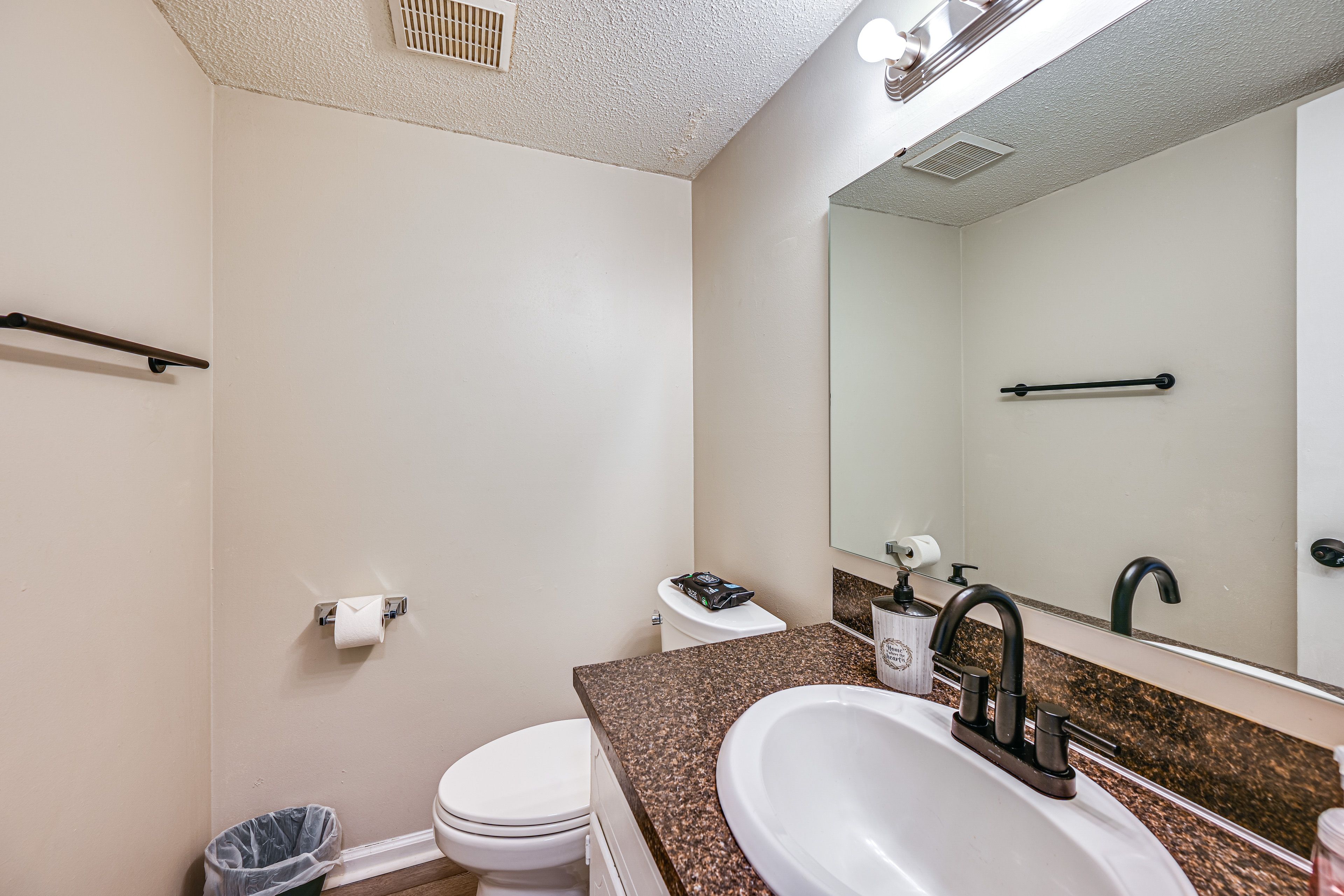 Half Bathroom | 1st Floor | Complimentary Toiletries | Towels Provided