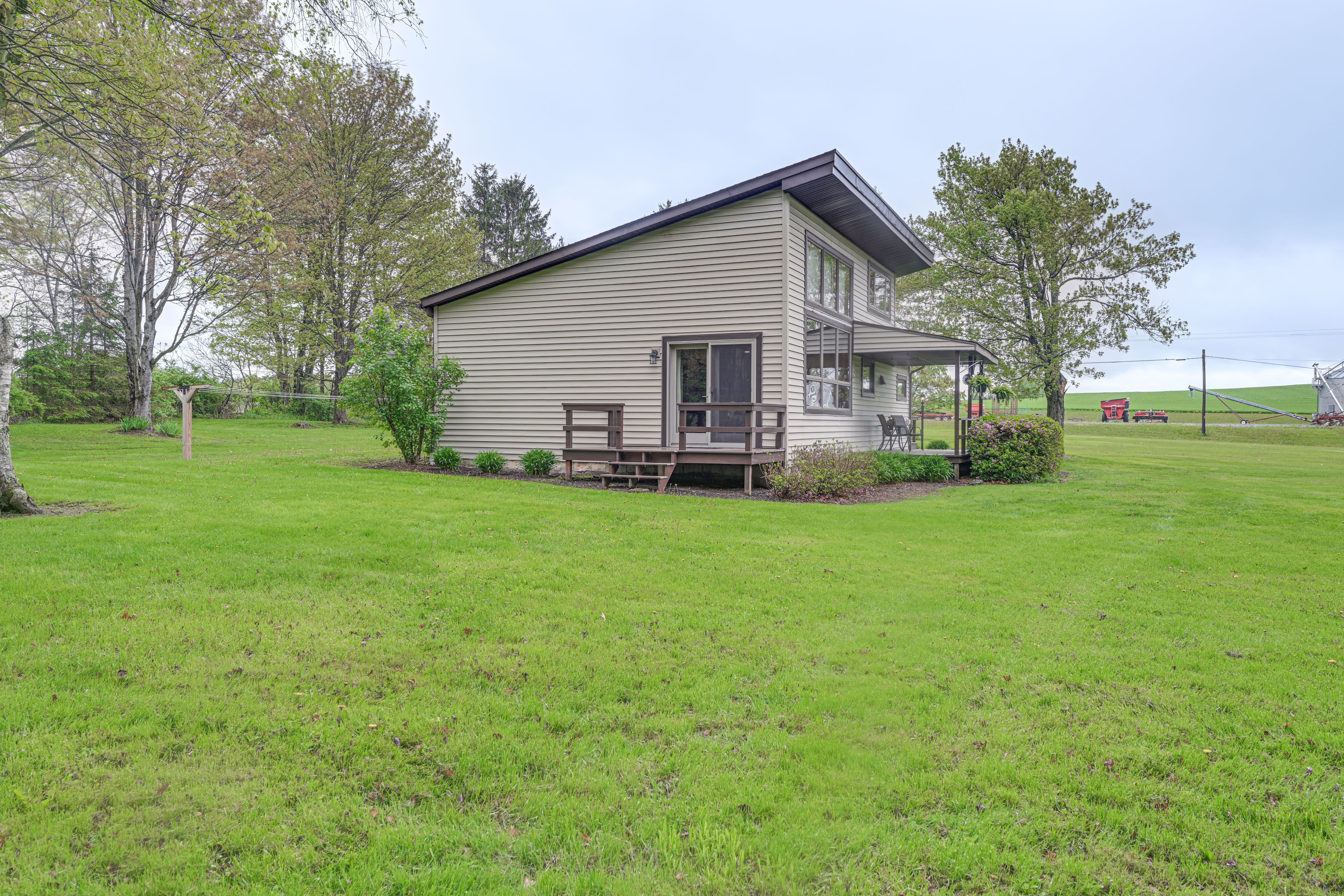 Cottage Exterior | Spacious Yard | Fire Pit