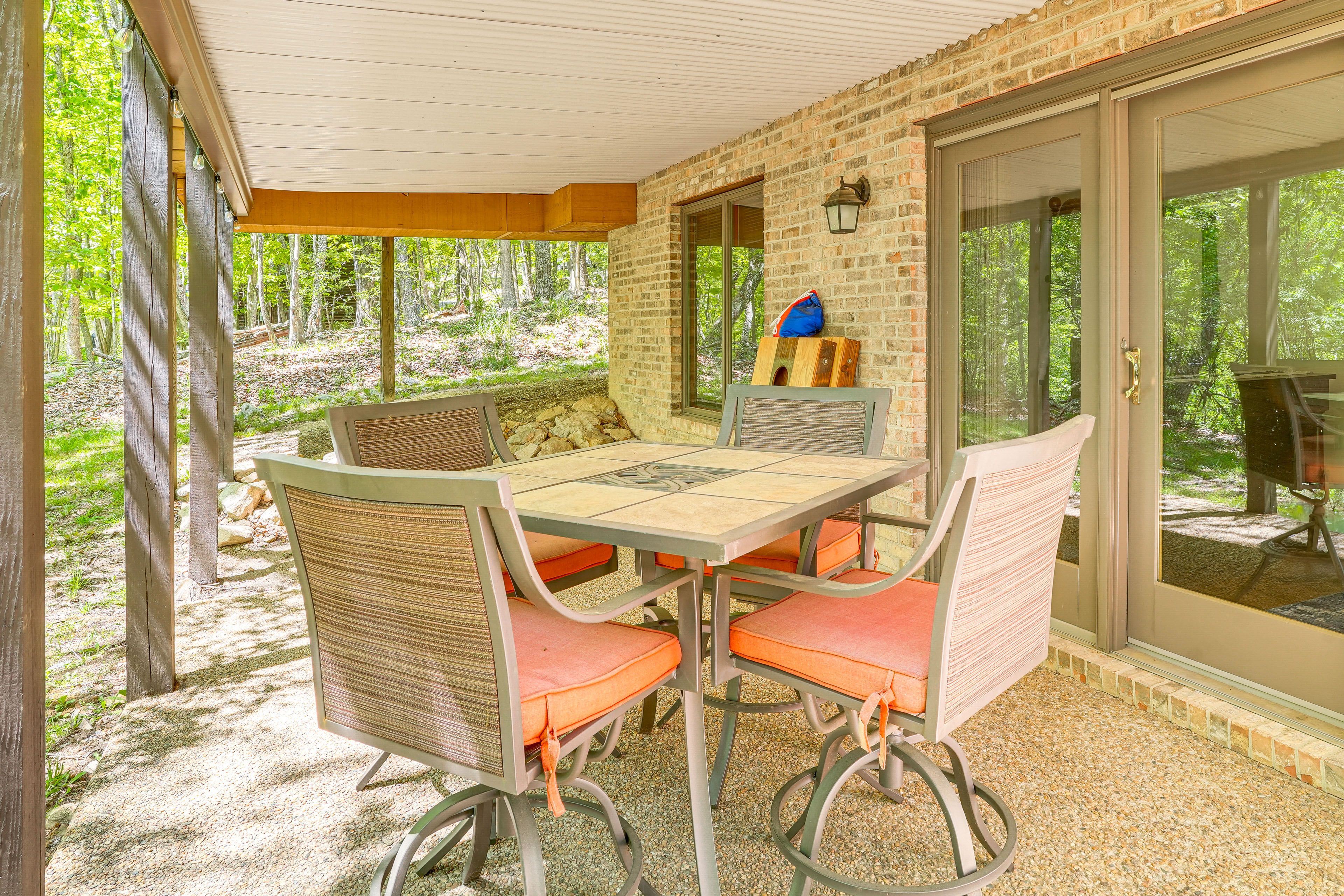 House Exterior | Covered Patio | Dining Area | Cornhole