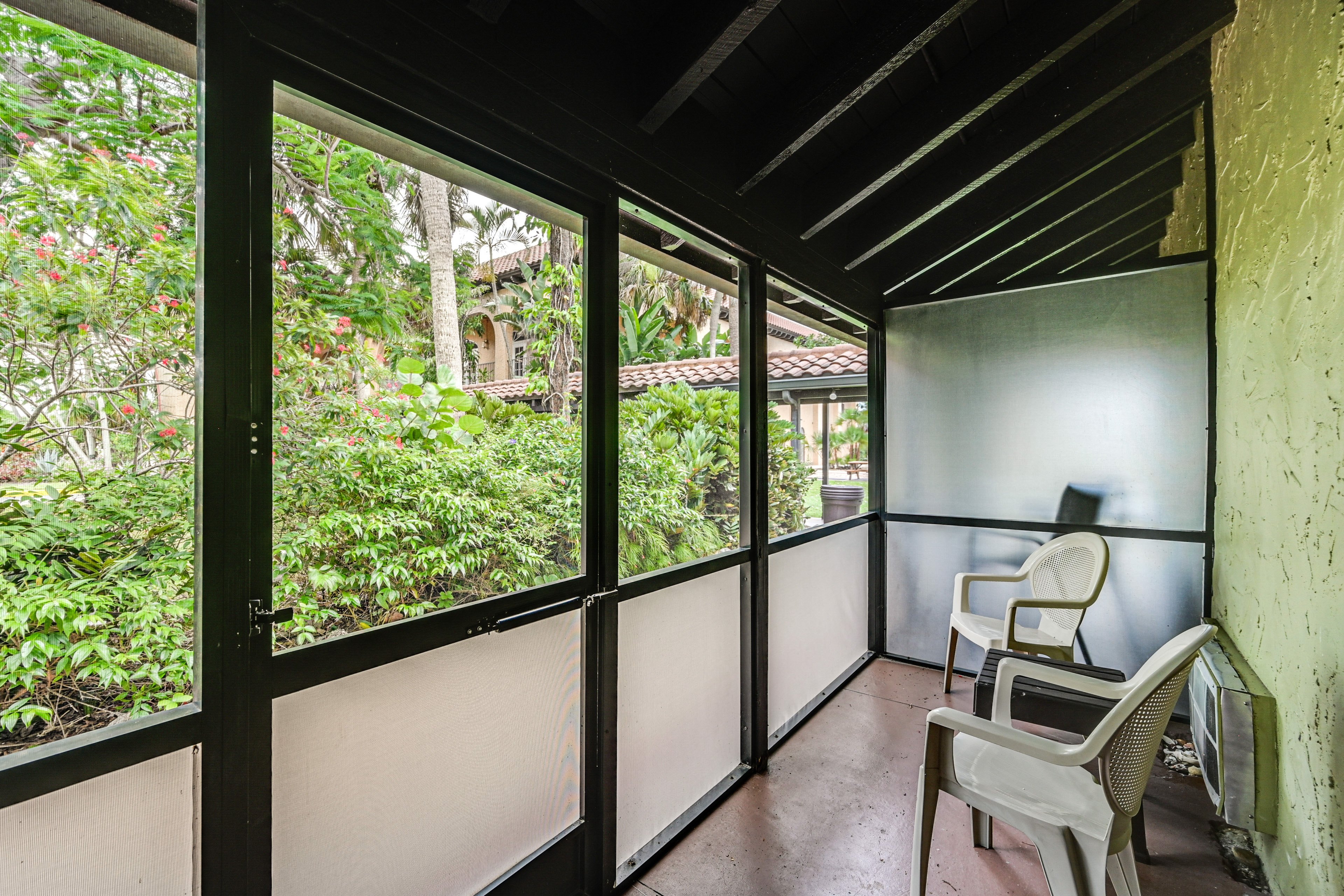 Unit Exterior | Screened Porch | Single-Story Condo