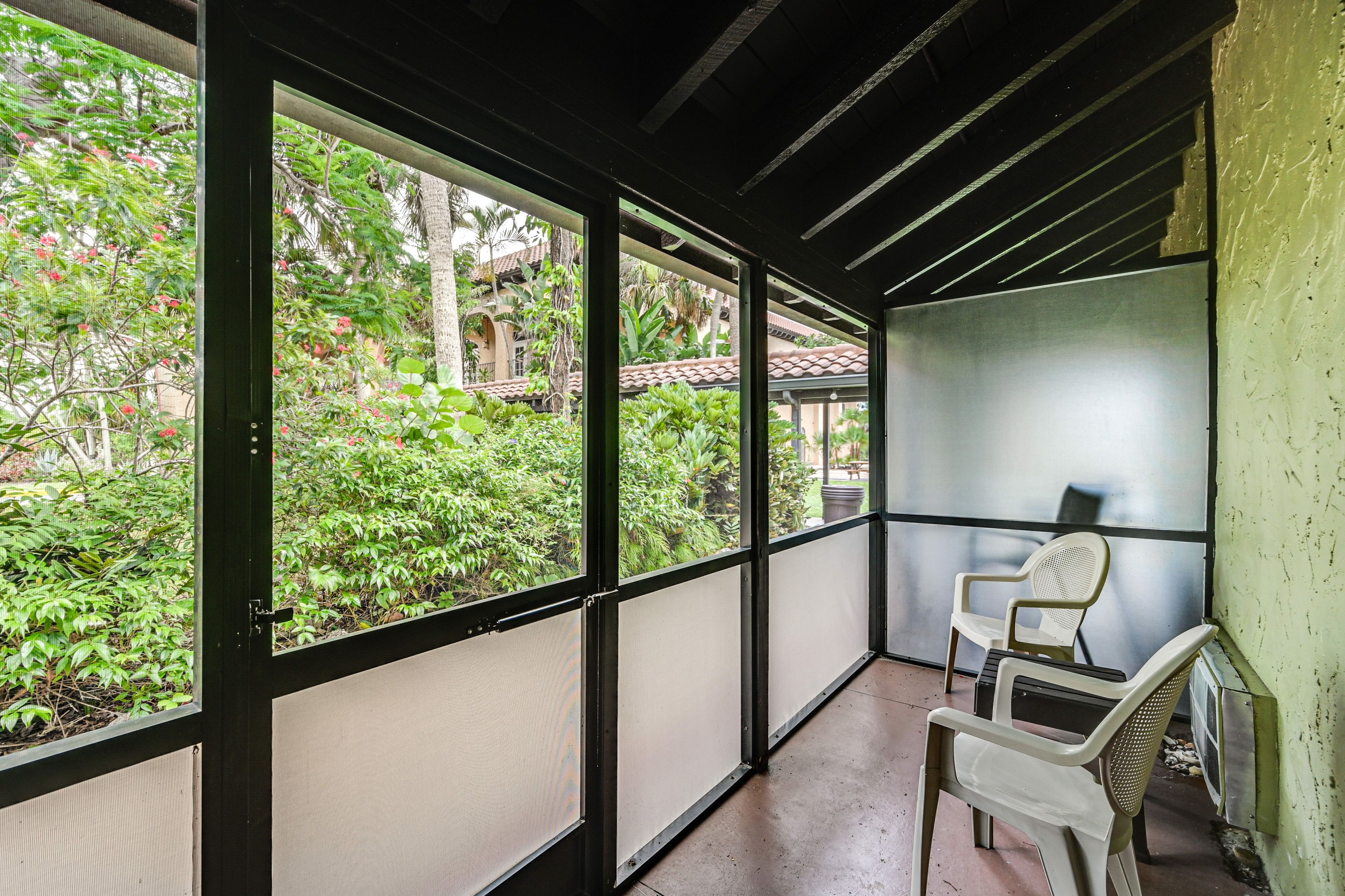 Unit Exterior | Screened Porch | Single-Story Condo