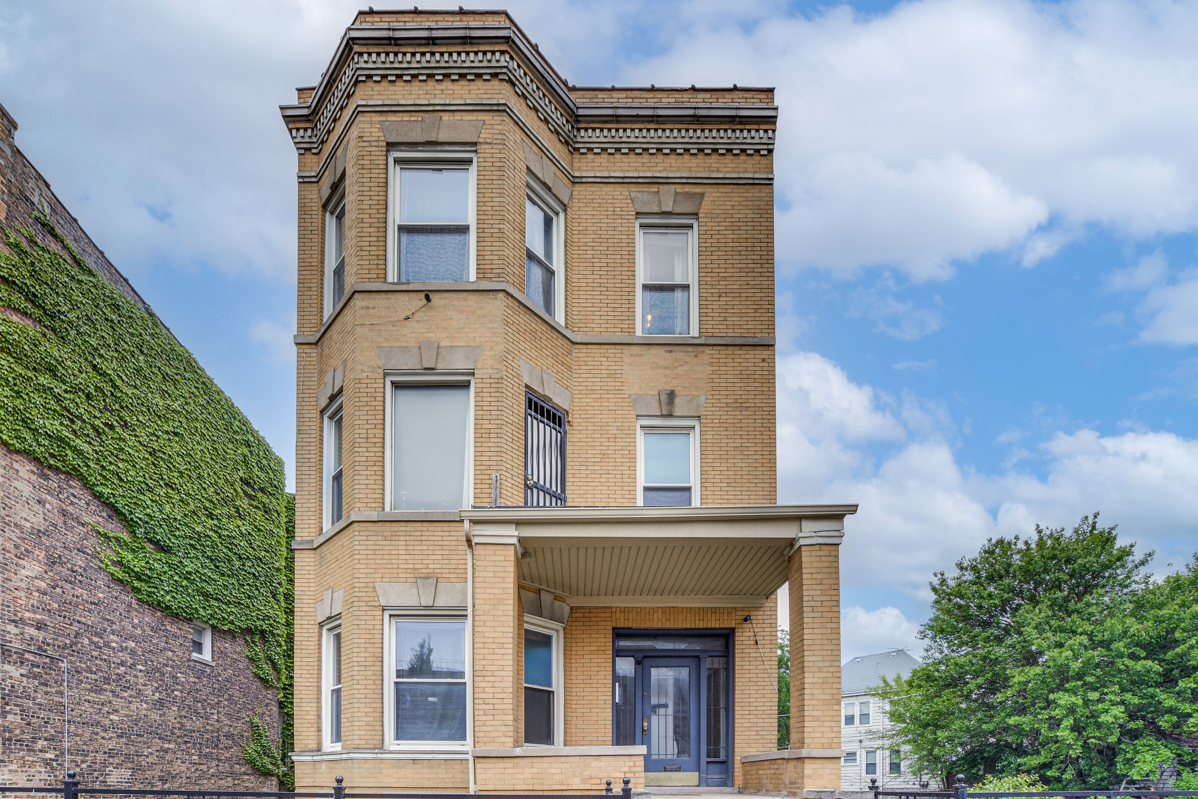 Building Exterior | 3rd-Floor Unit
