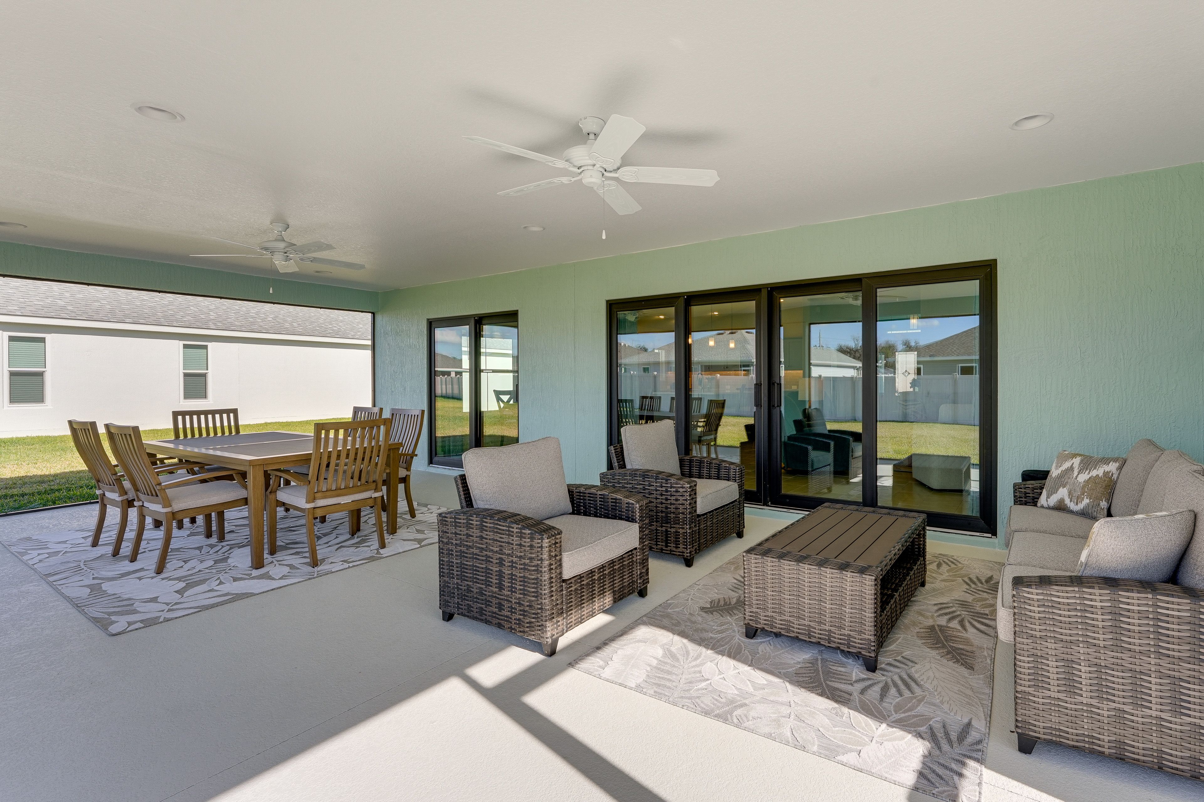 Lanai | Outdoor Lounge Seating | Dining Table | Cornhole