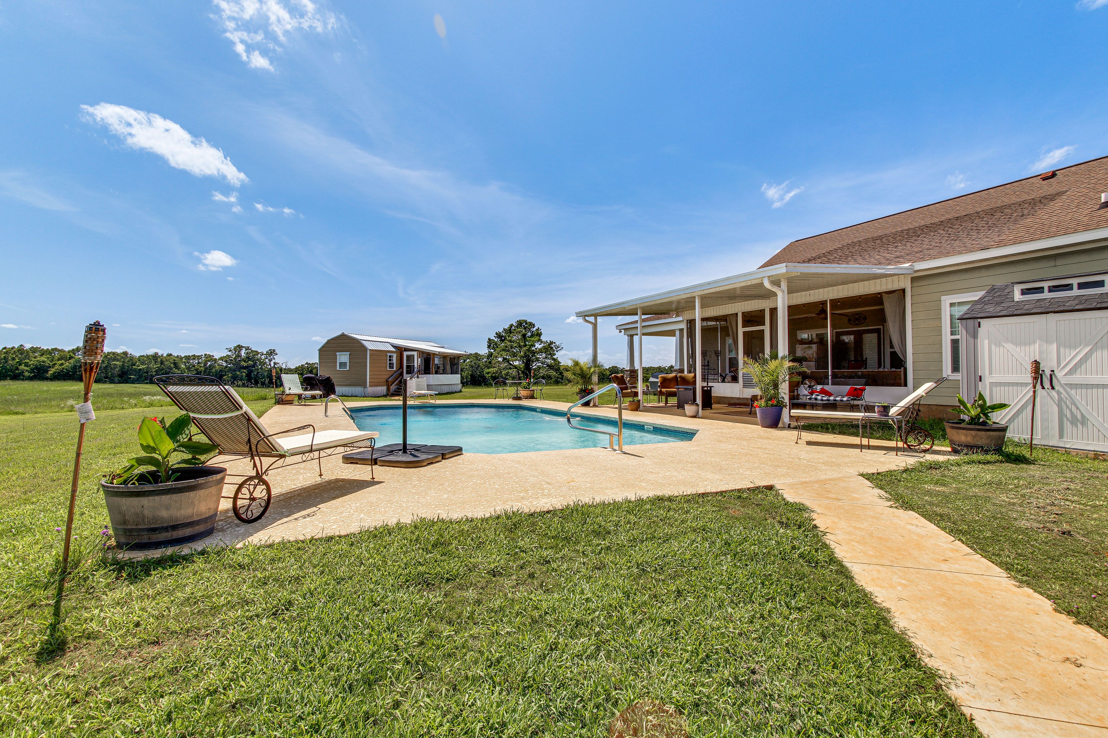 Cabin Exterior | Shared Pool & Lounge Chairs