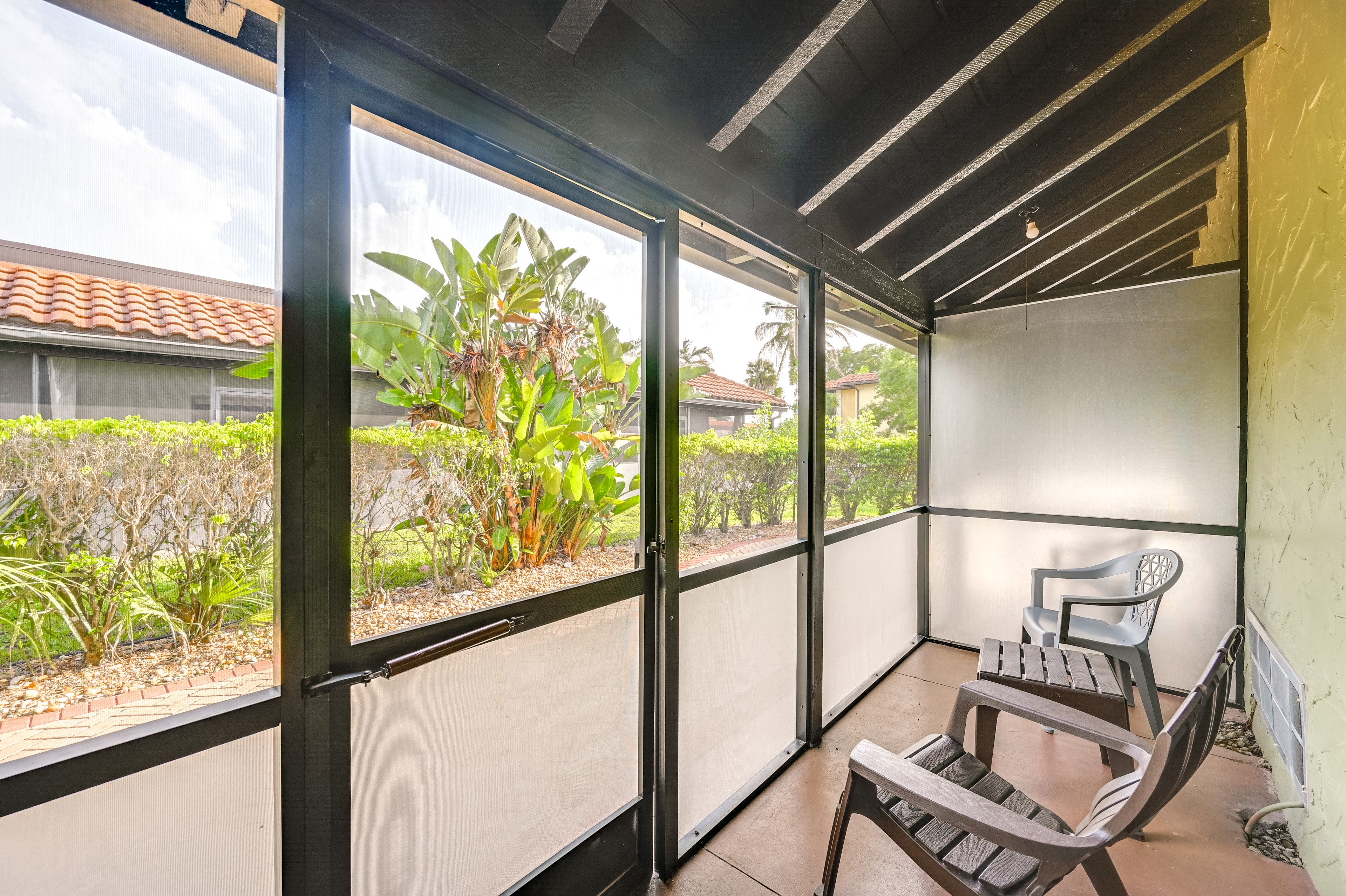 Unit Exterior | Screened Porch | Single-Story Condo
