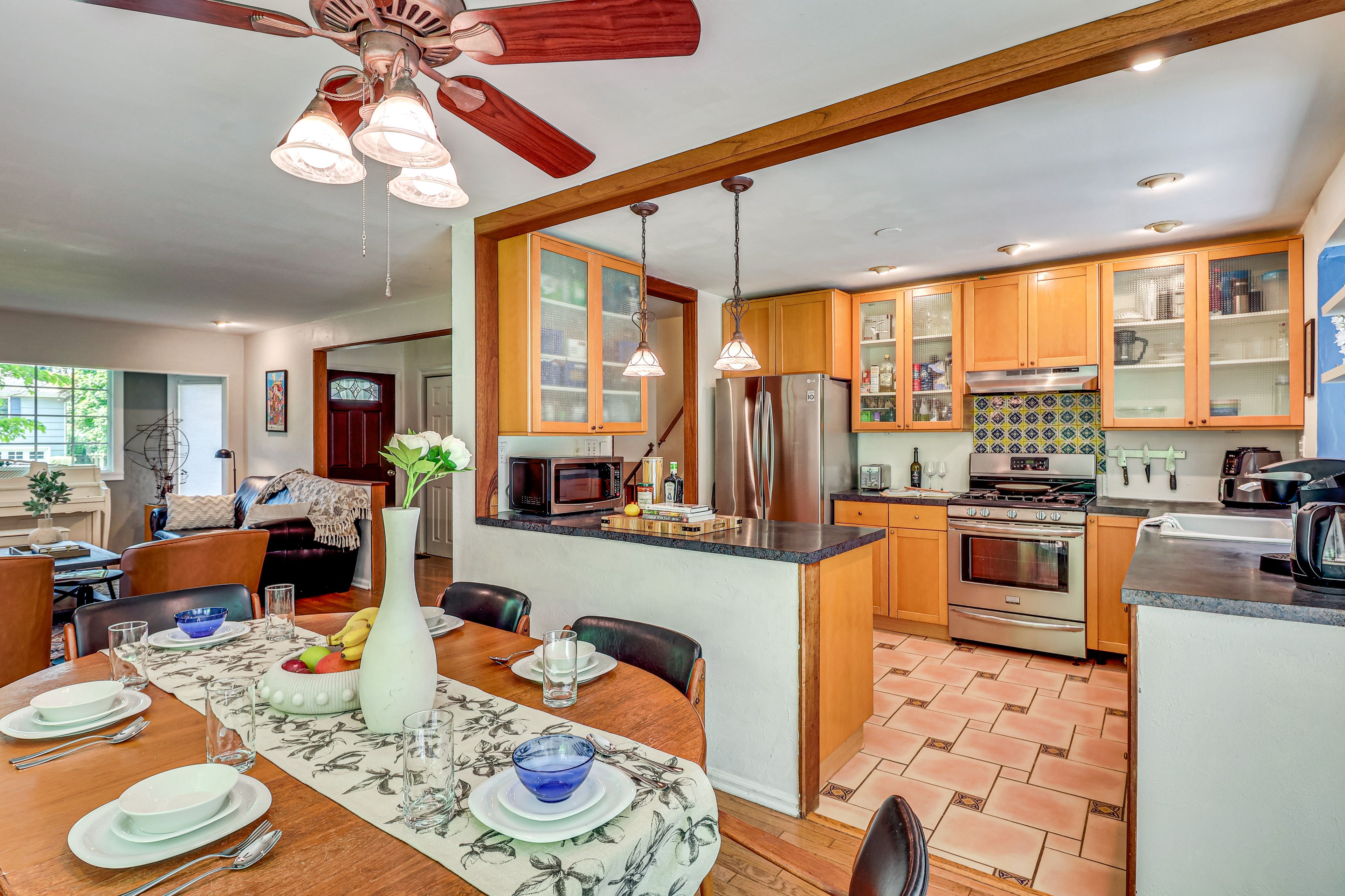 Kitchen & Dining Area | In-Unit Laundry | Central Heating & A/C