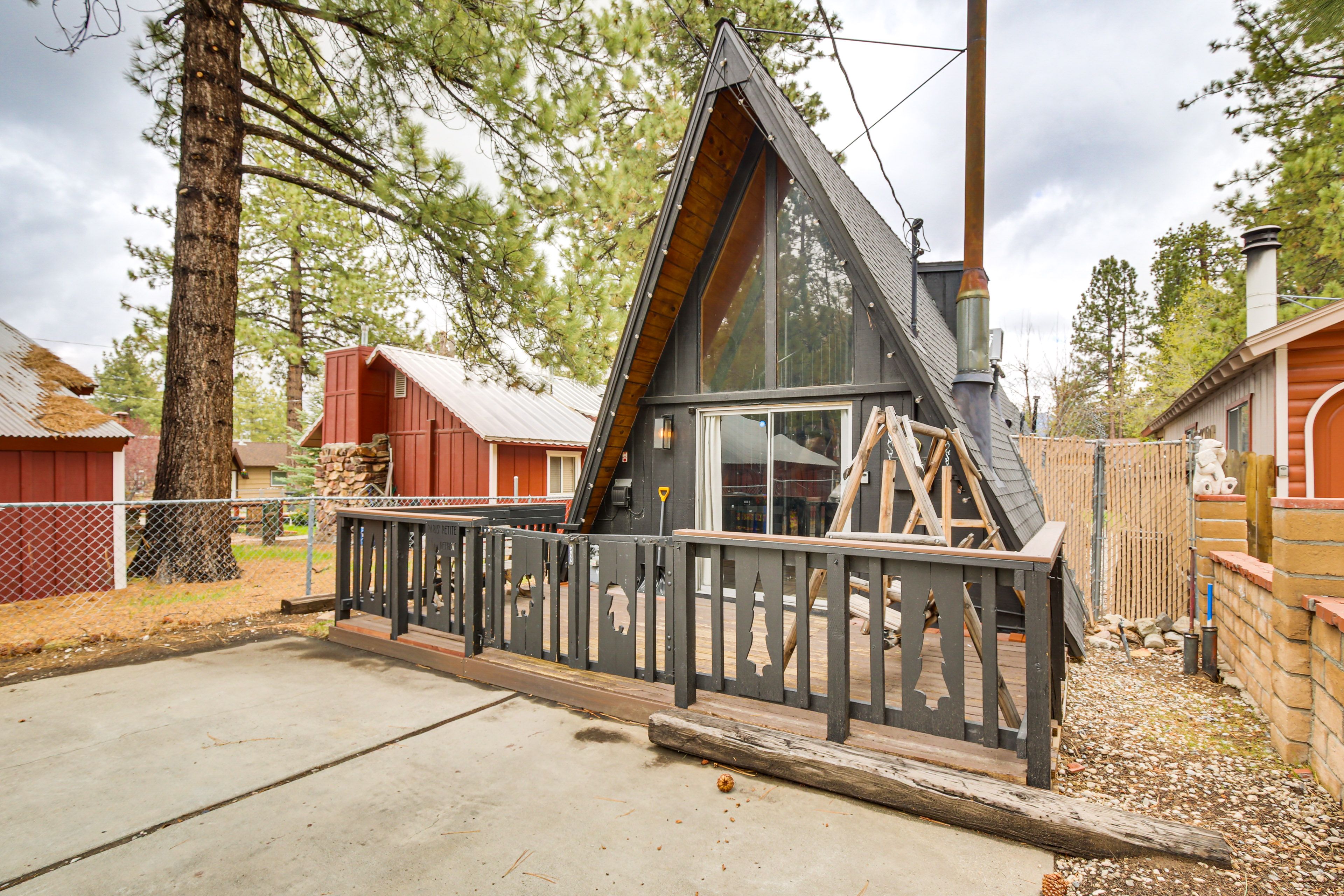 Property Exterior | 2-Story Cabin | Gated Front Porch