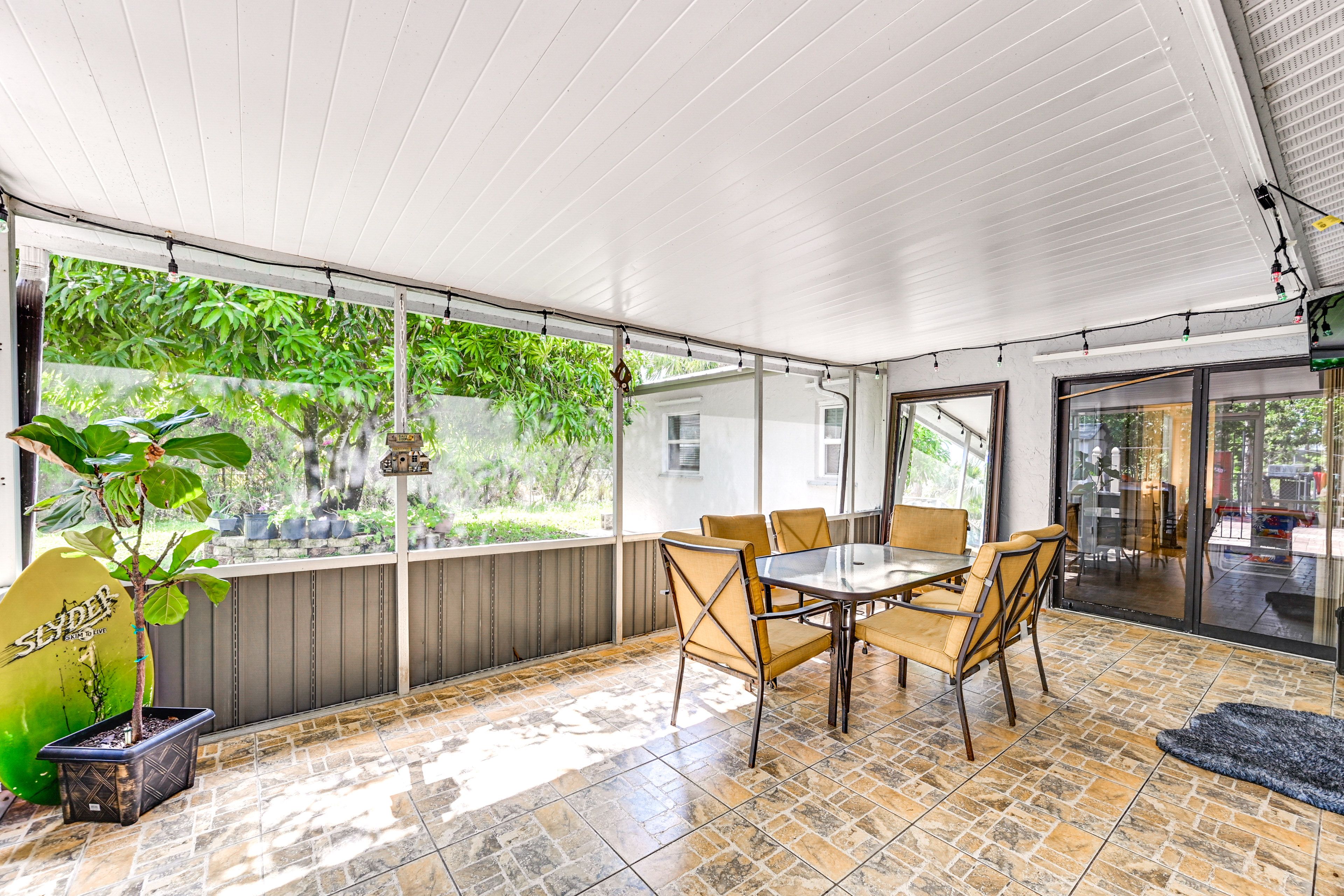 House Exterior | Screened Patio | Dining Area