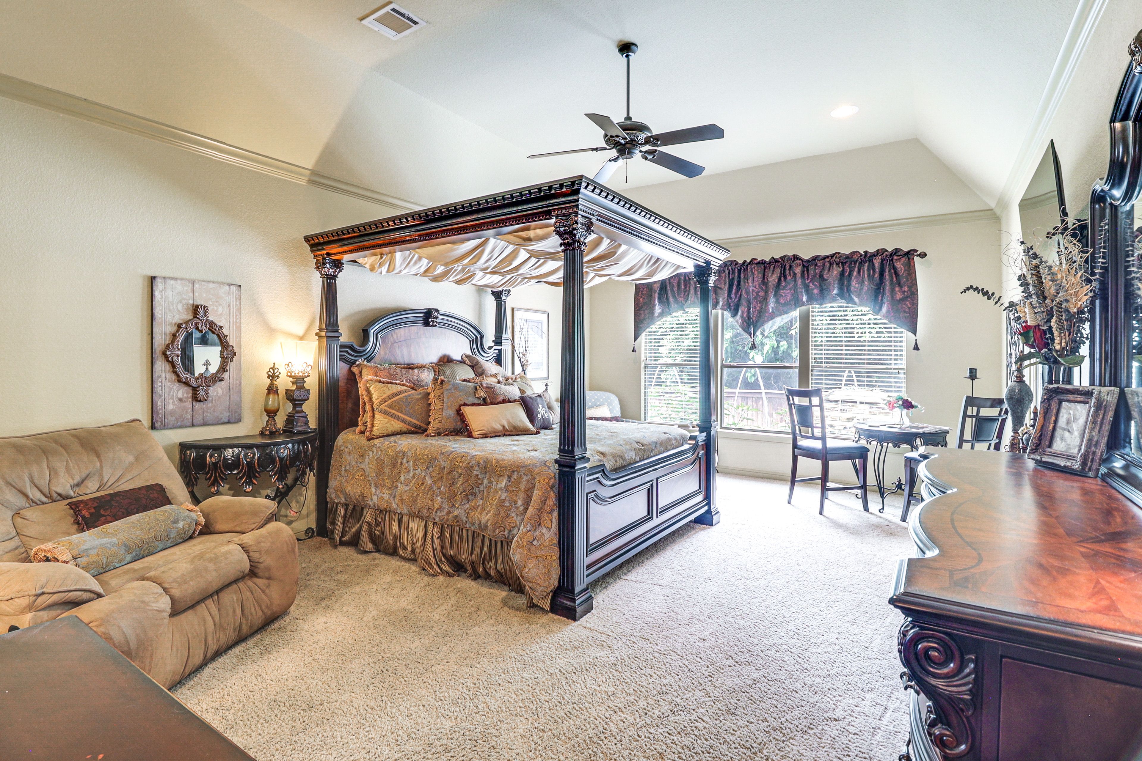 Bedroom 1 | 1st Floor | King Bed | Vanity | En-Suite Bathroom | Patio Access