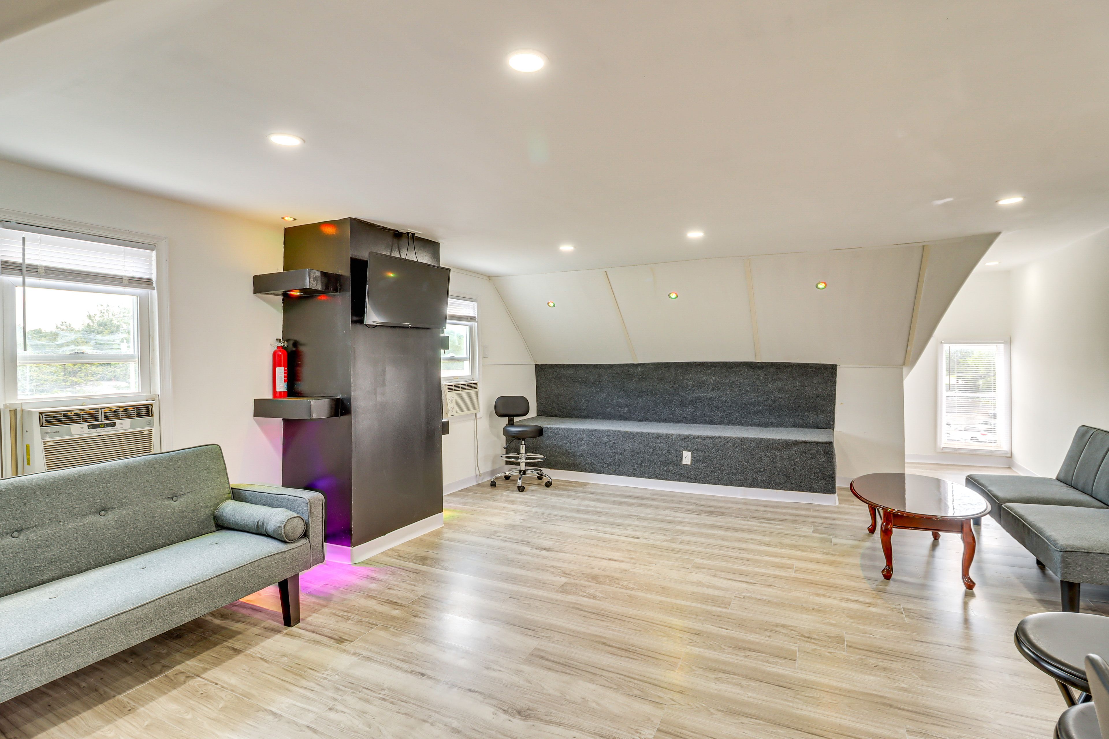 Living Room | 2 Twin Futons | Free WiFi | Window A/C & Heating Units