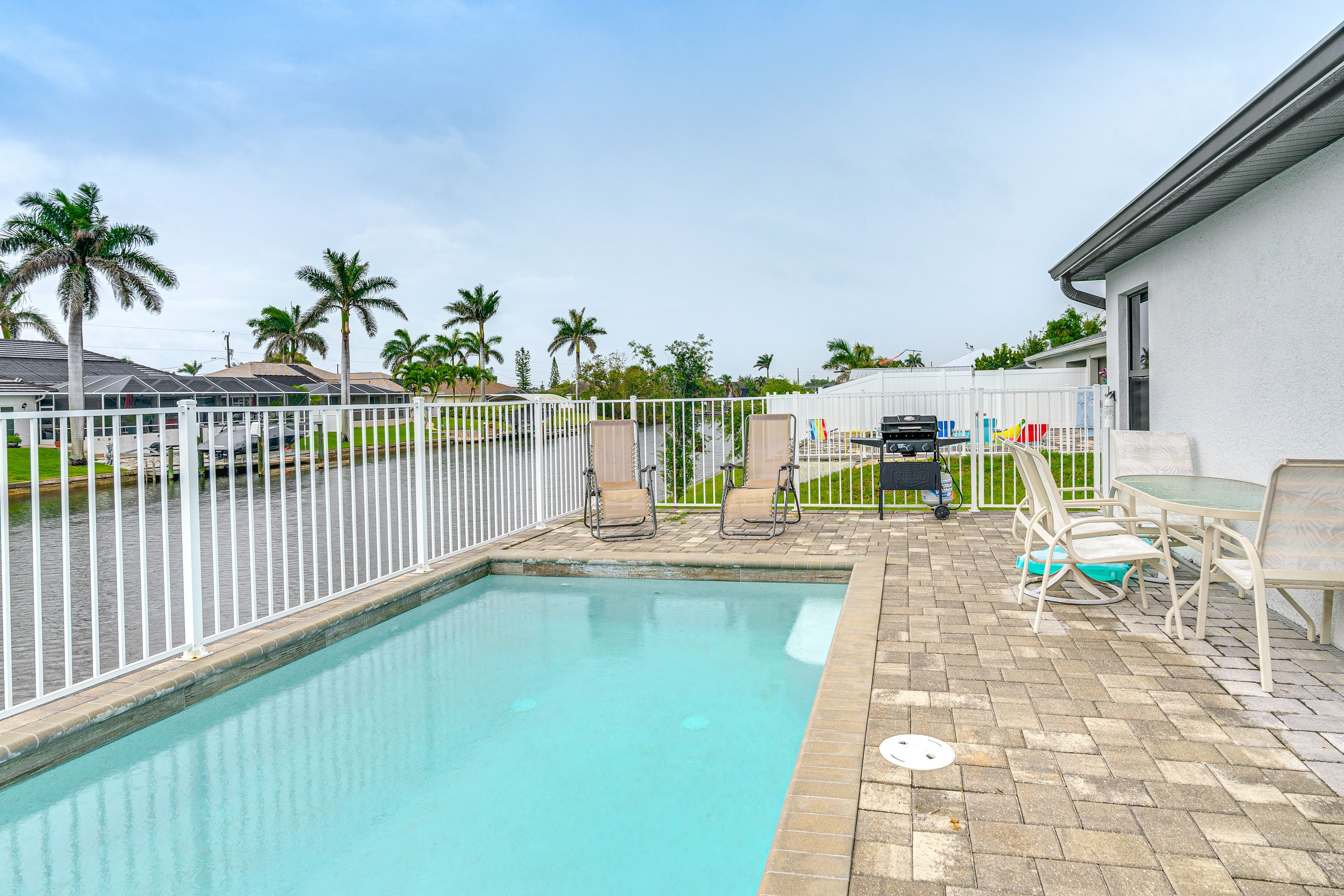 Patio | Heated Pool | Gas Grill | Outdoor Dining Area | Canal Views